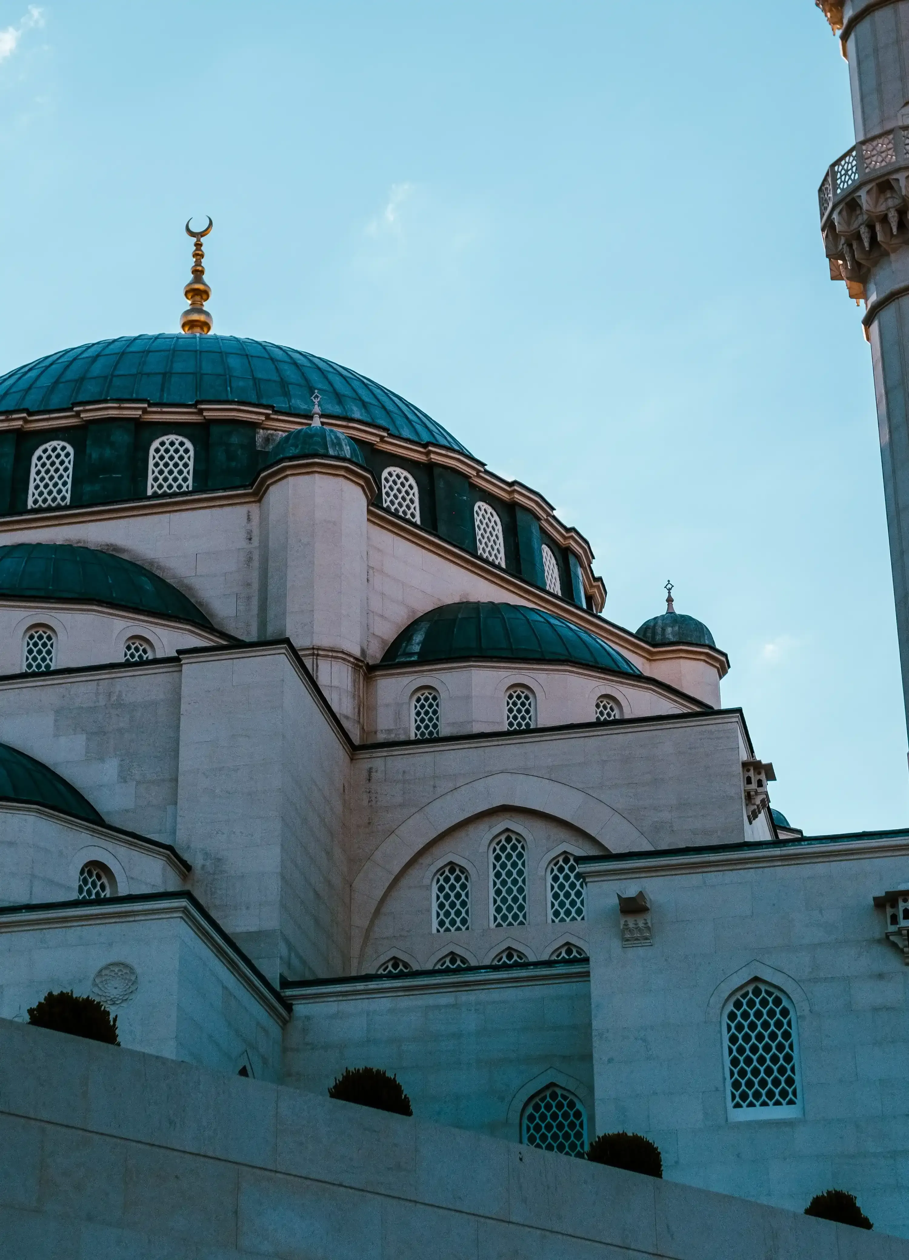 The historic Et'hem Bey Mosque in the center of Tirana, standing out among the modern buildings in Skanderbeg Square.