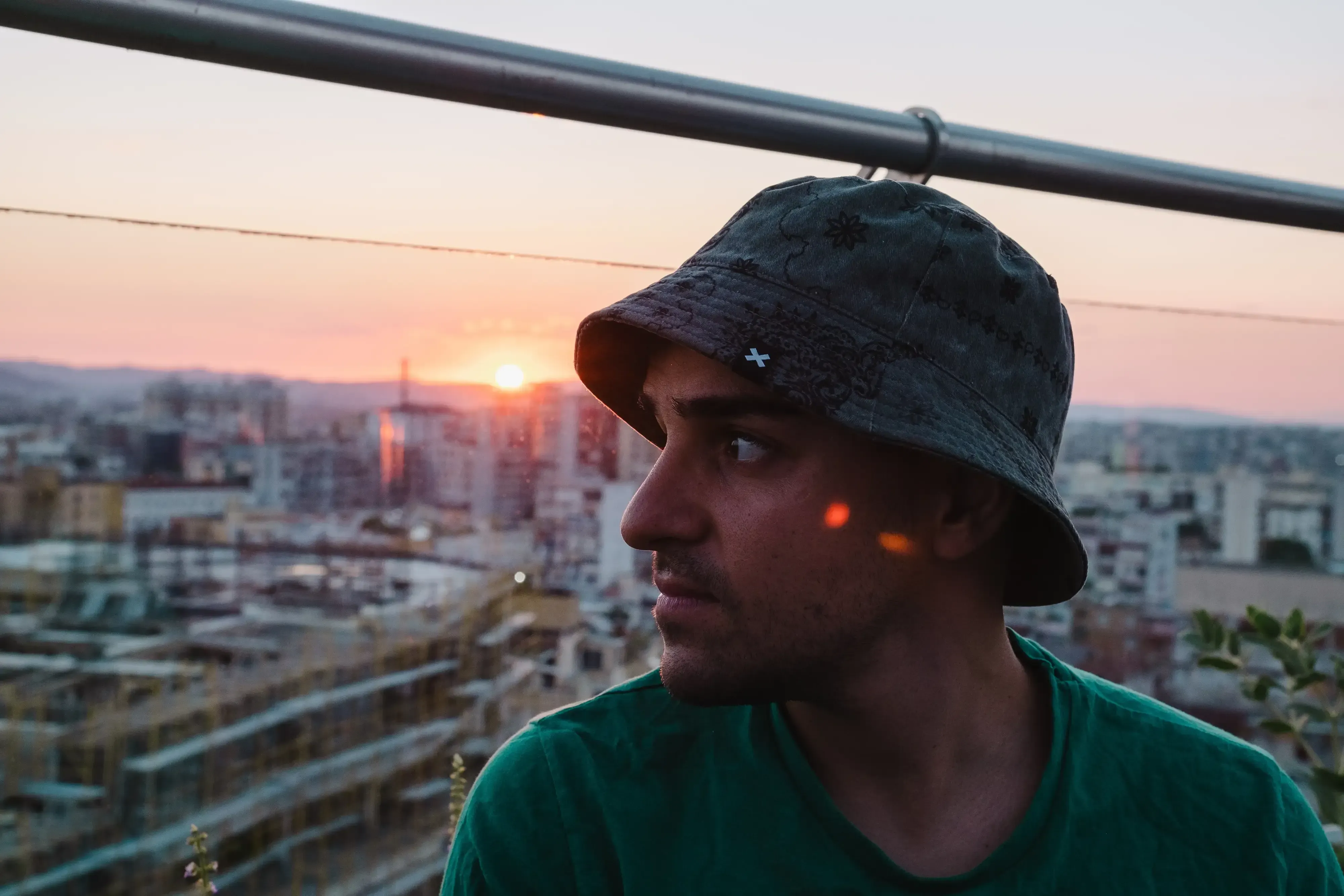 Ieser with the view of the cityscape of Tirana in the background.
