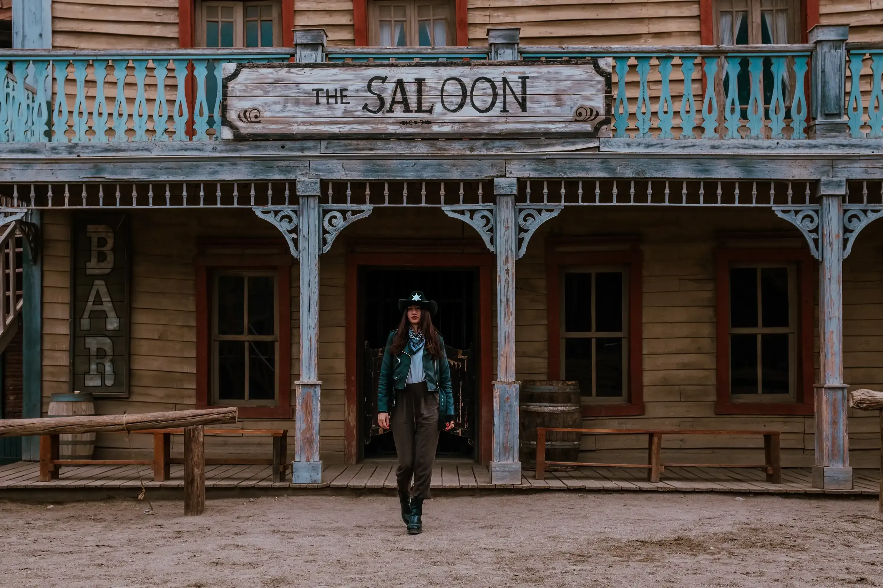 Miriam standing in front of the Saloon building in Fort Bravo