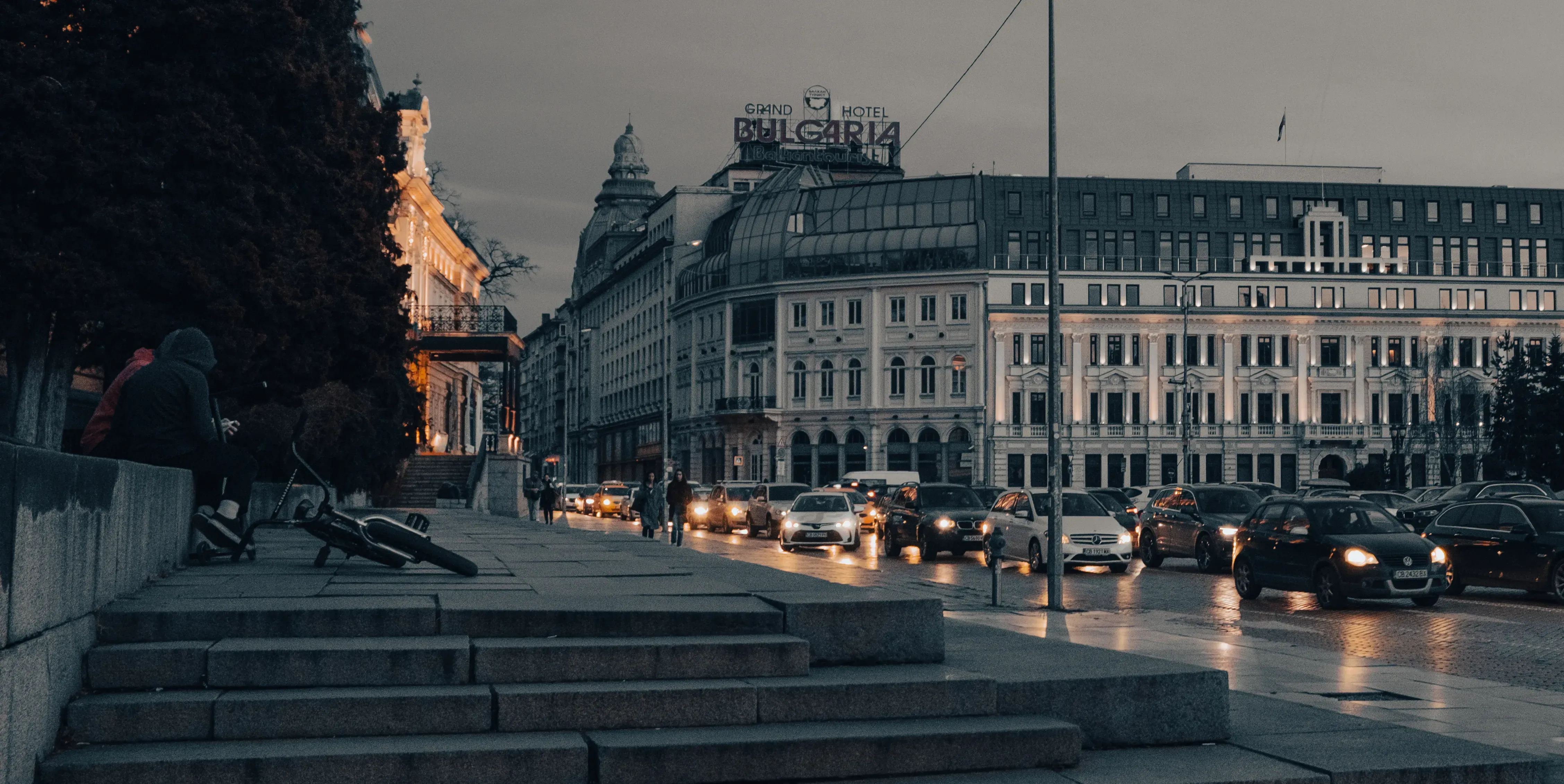 View down one of the main streets in the center of Sofia at night.
