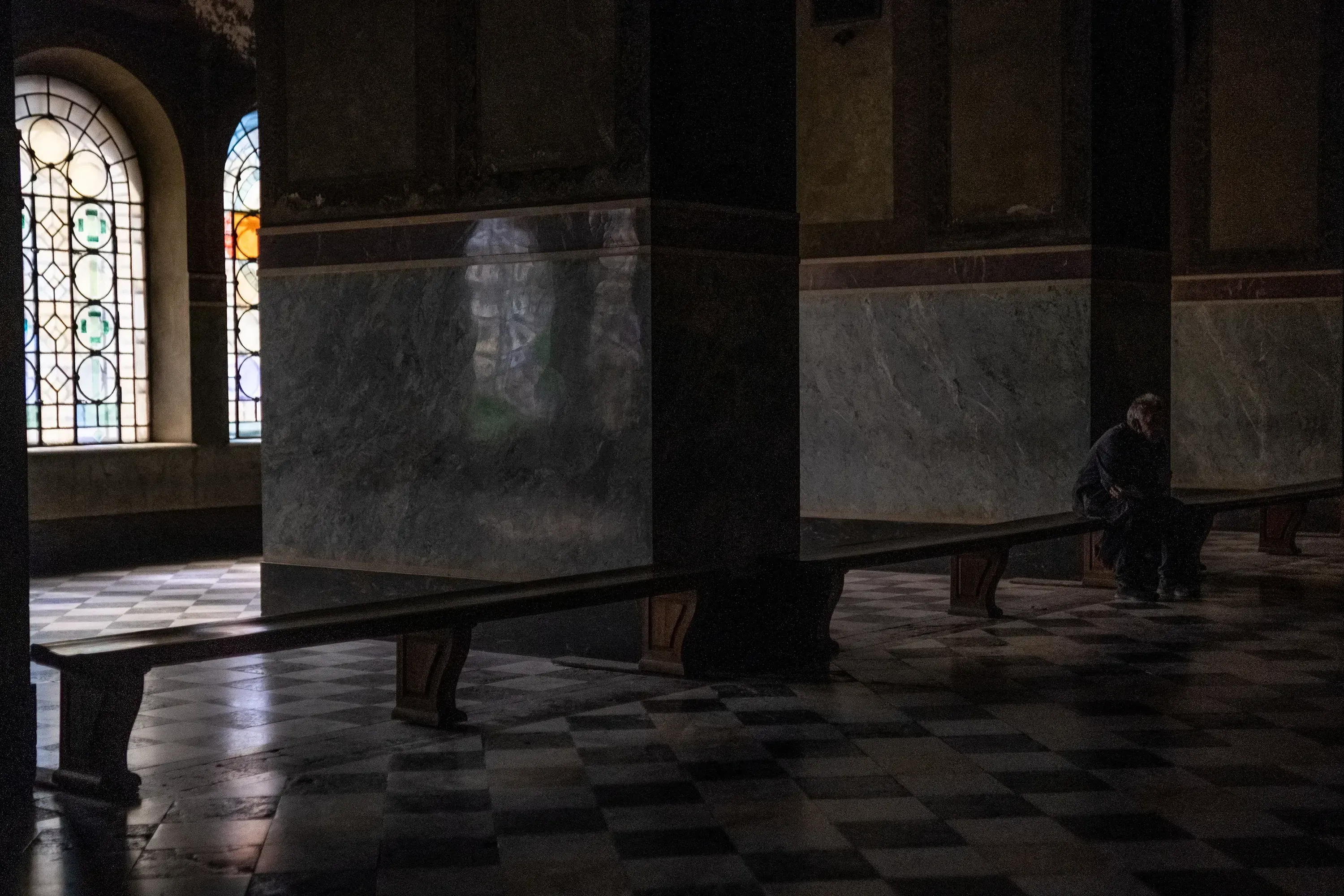 Wooden benches or pews inside the Alexander Nevsky Cathedral interior.