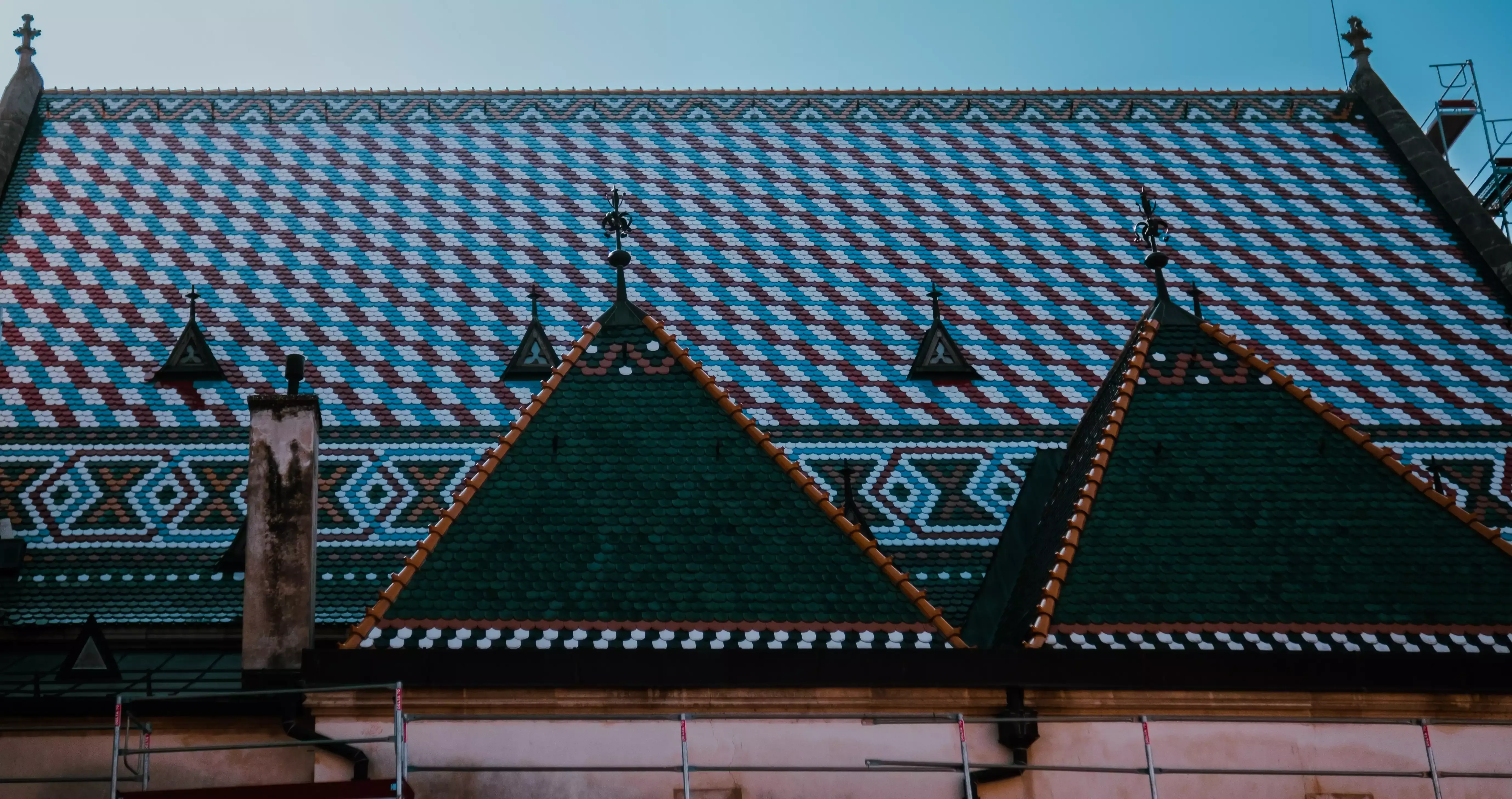 Close-up detail of St. Mark's Church roof, showing the bright, heraldic tile pattern.