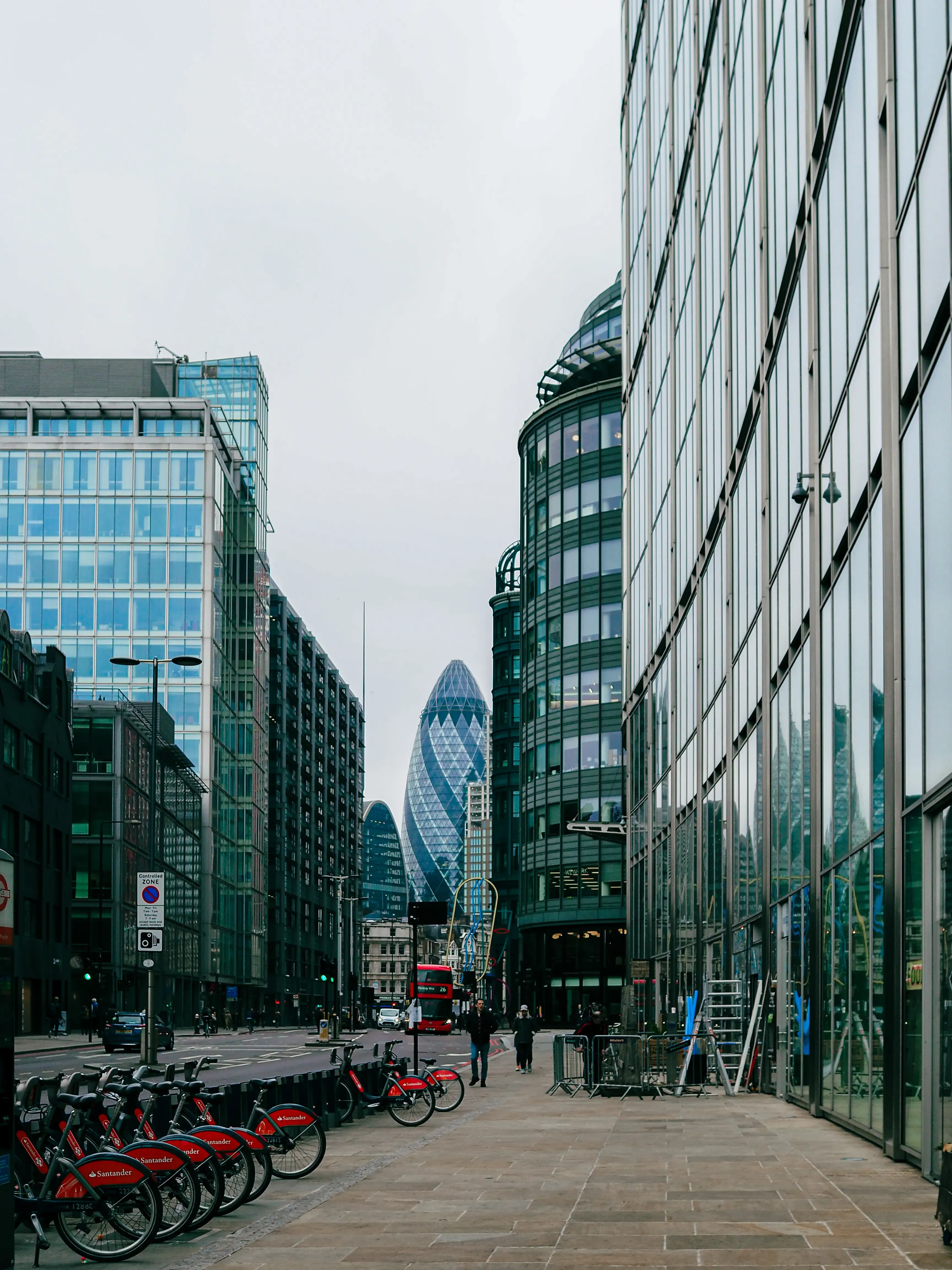 Low-angle shot emphasizing the height and glass facade of a modern London skyscraper