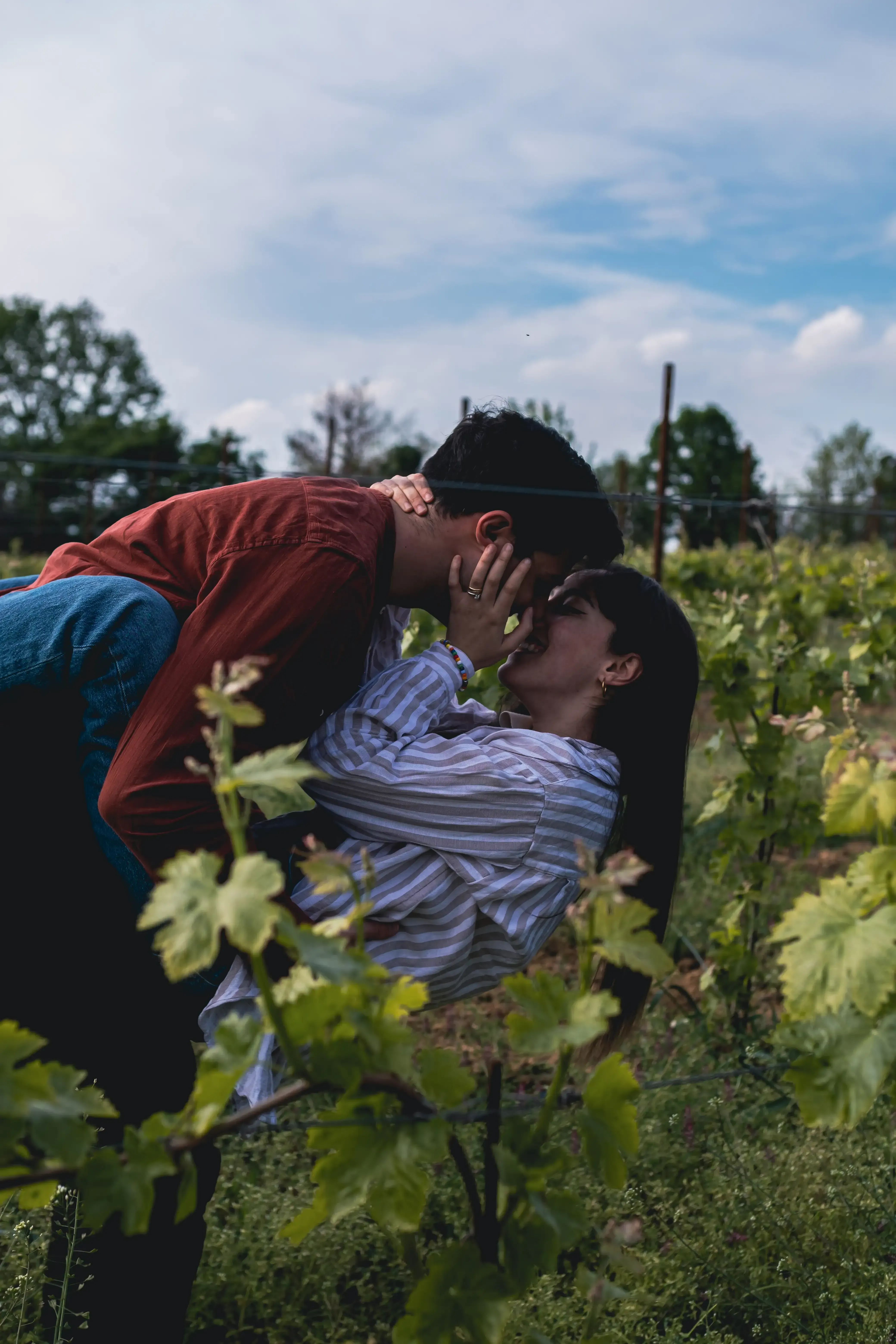 Giuseppe and Indya dancing in a vineyard