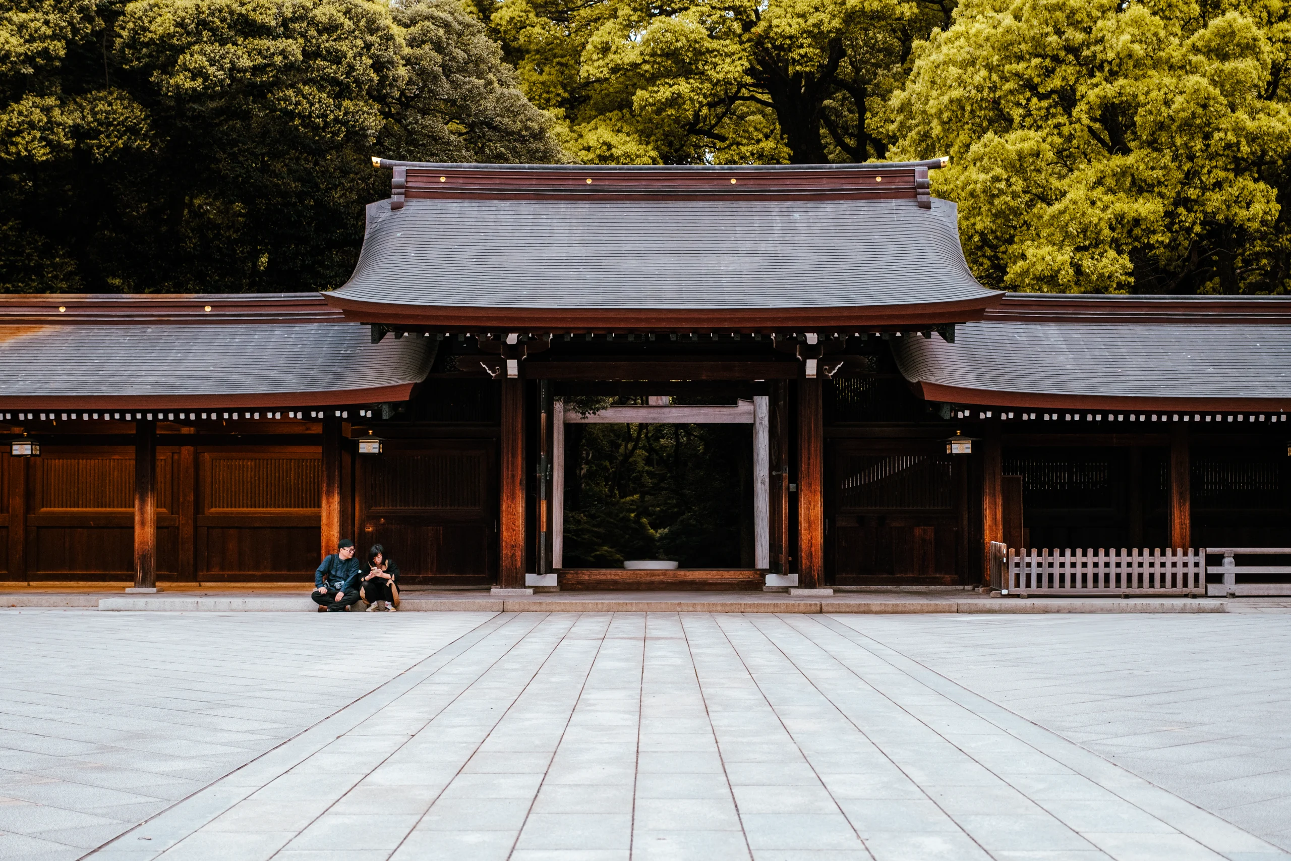 Traditional wooden gate leading to the inner courtyard of Meiji Jingu Shrine