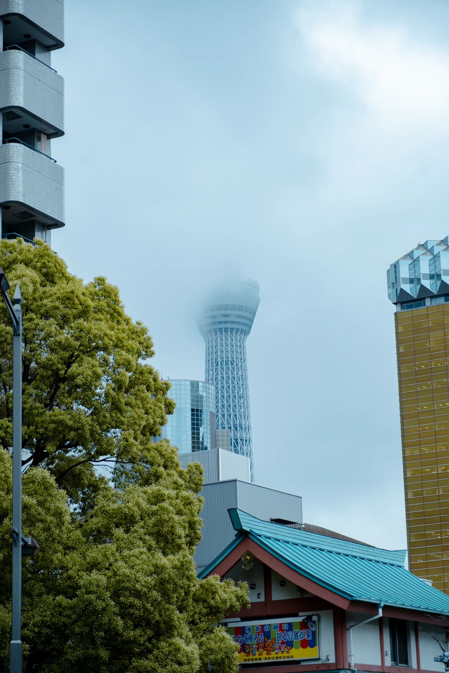 View of the Tokyo Skytree tower shrouded in fog