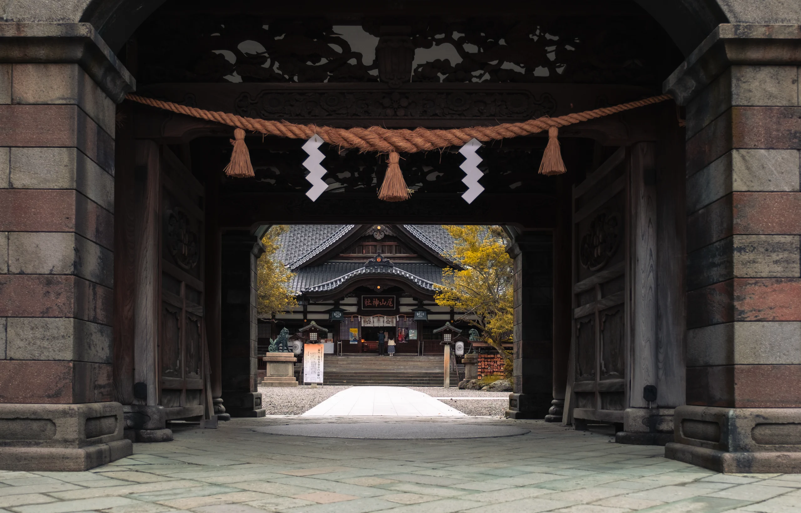 Traditional wooden entrance gate of a Buddhist temple in Kyoto
