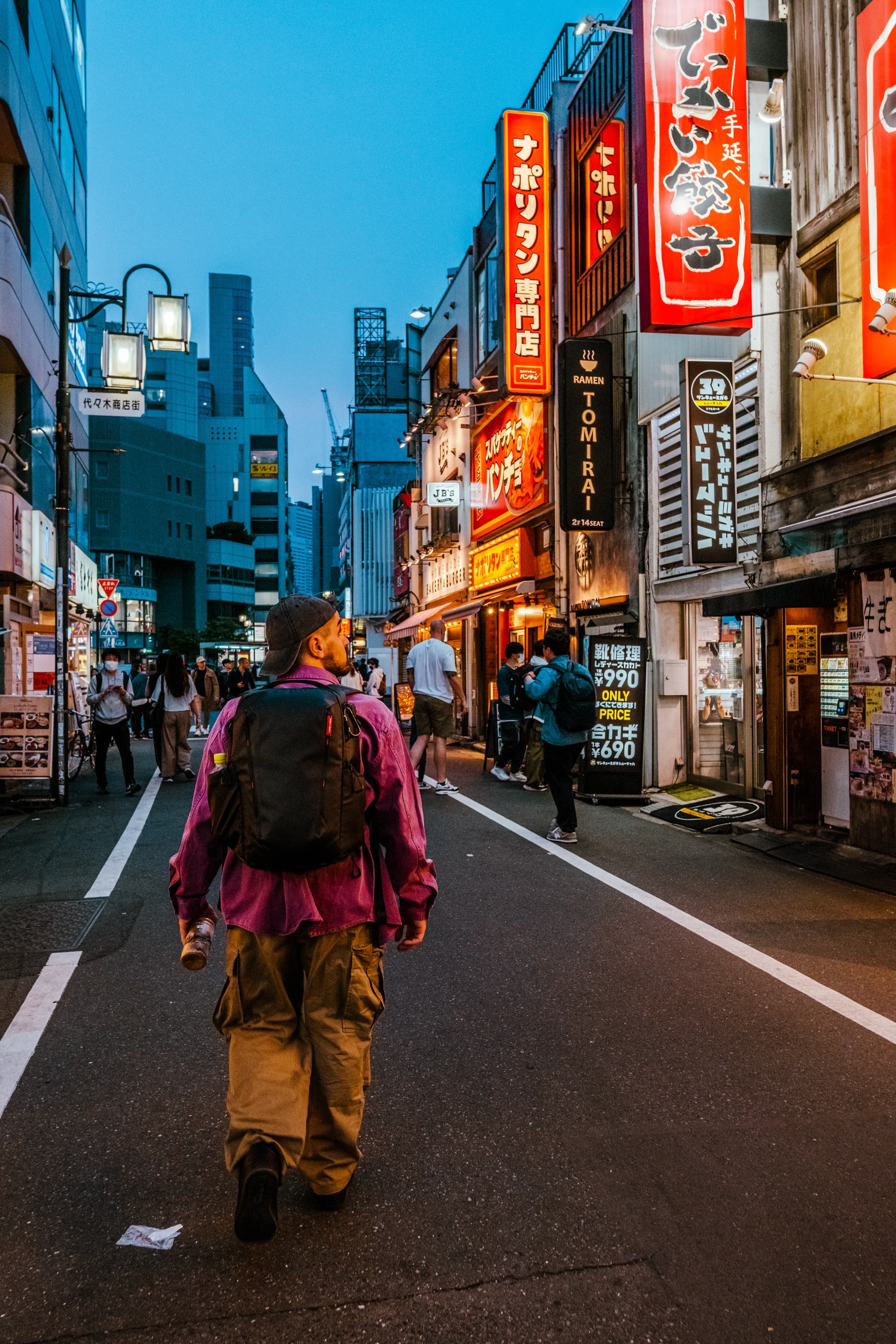 Ieser walking in Tokyo at sunset