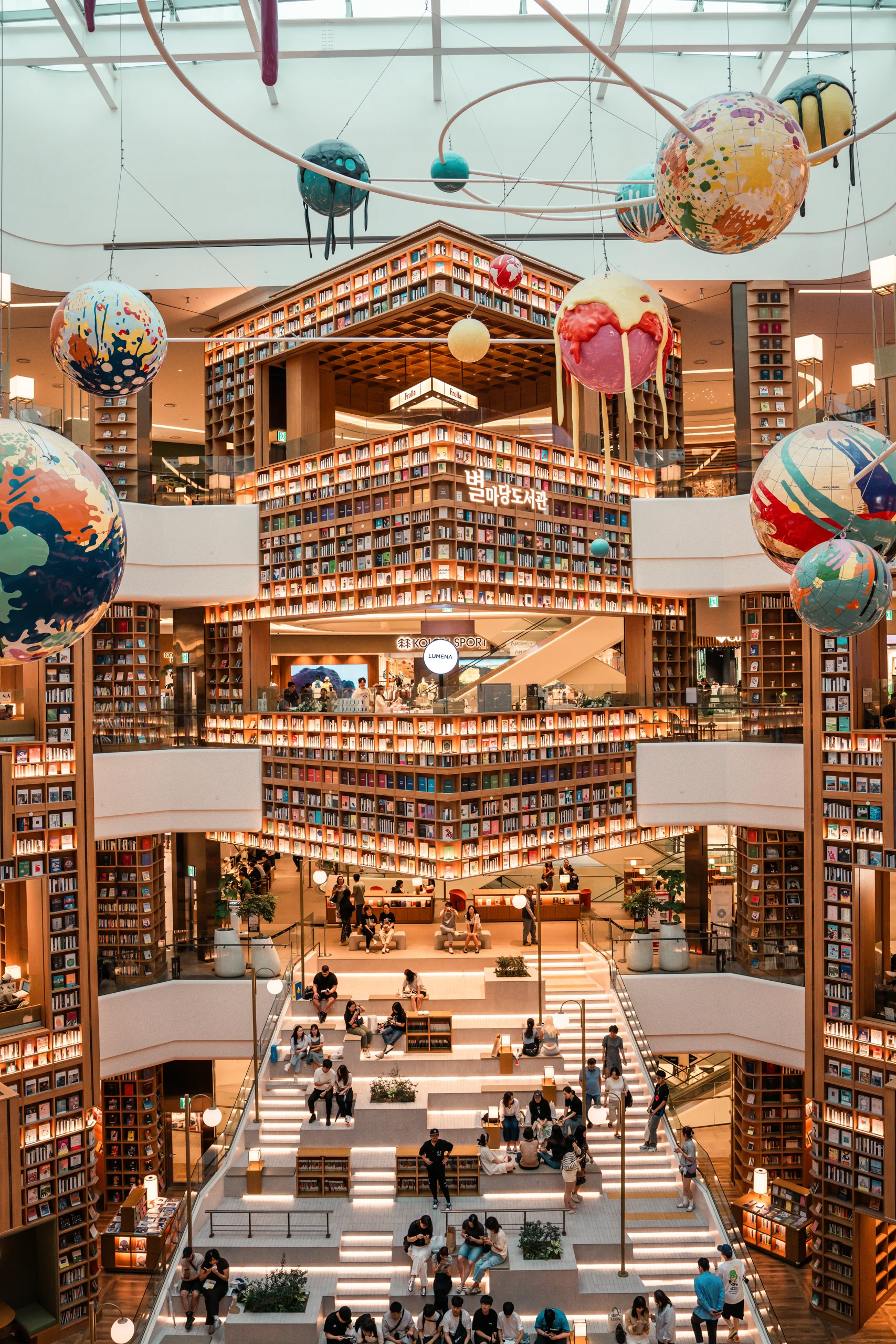 View of the massive, multi-level Starfield Suwon Library from the highest floor.