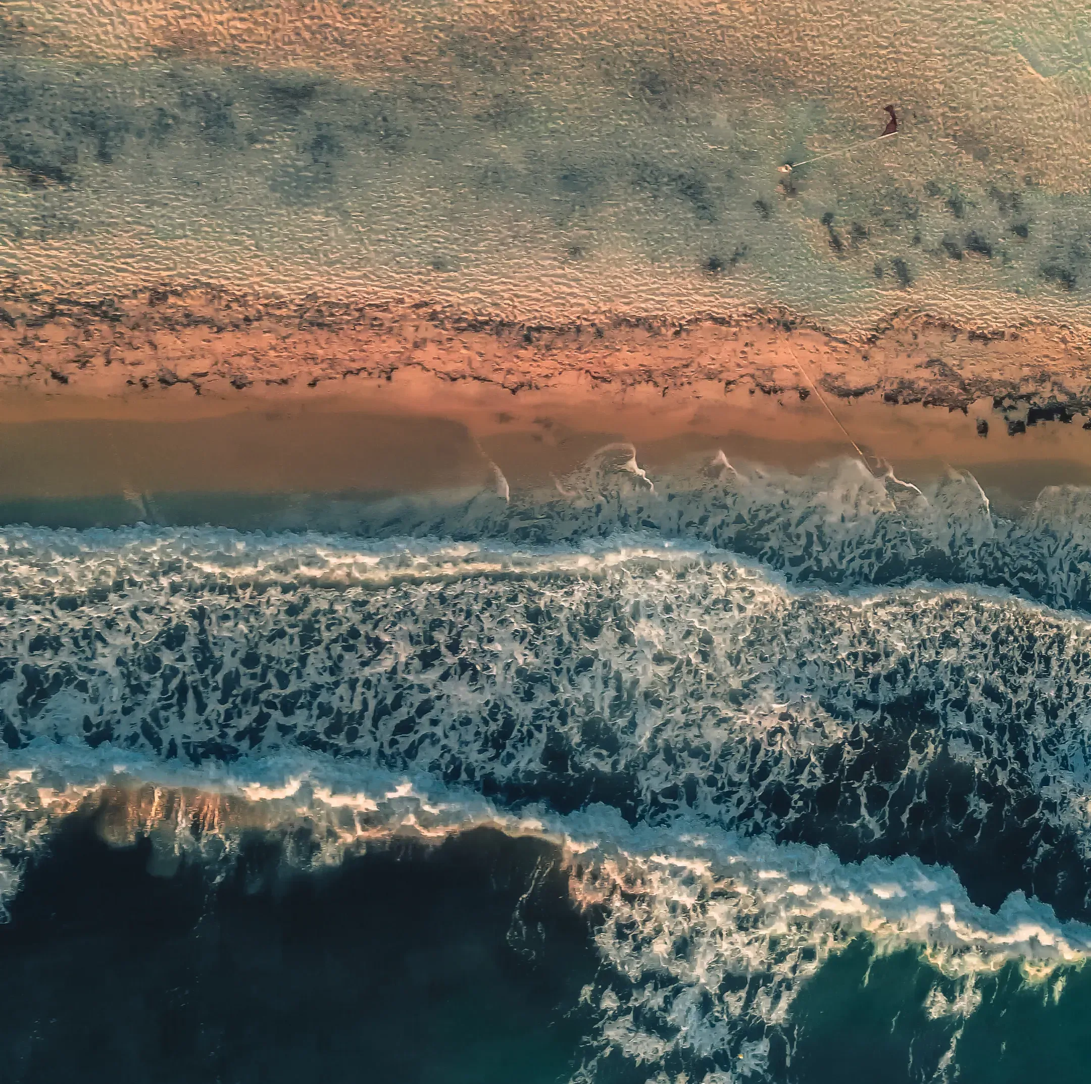 Aerial drone shot capturing the entire stretch of the scenic beach on the island of Kos.
