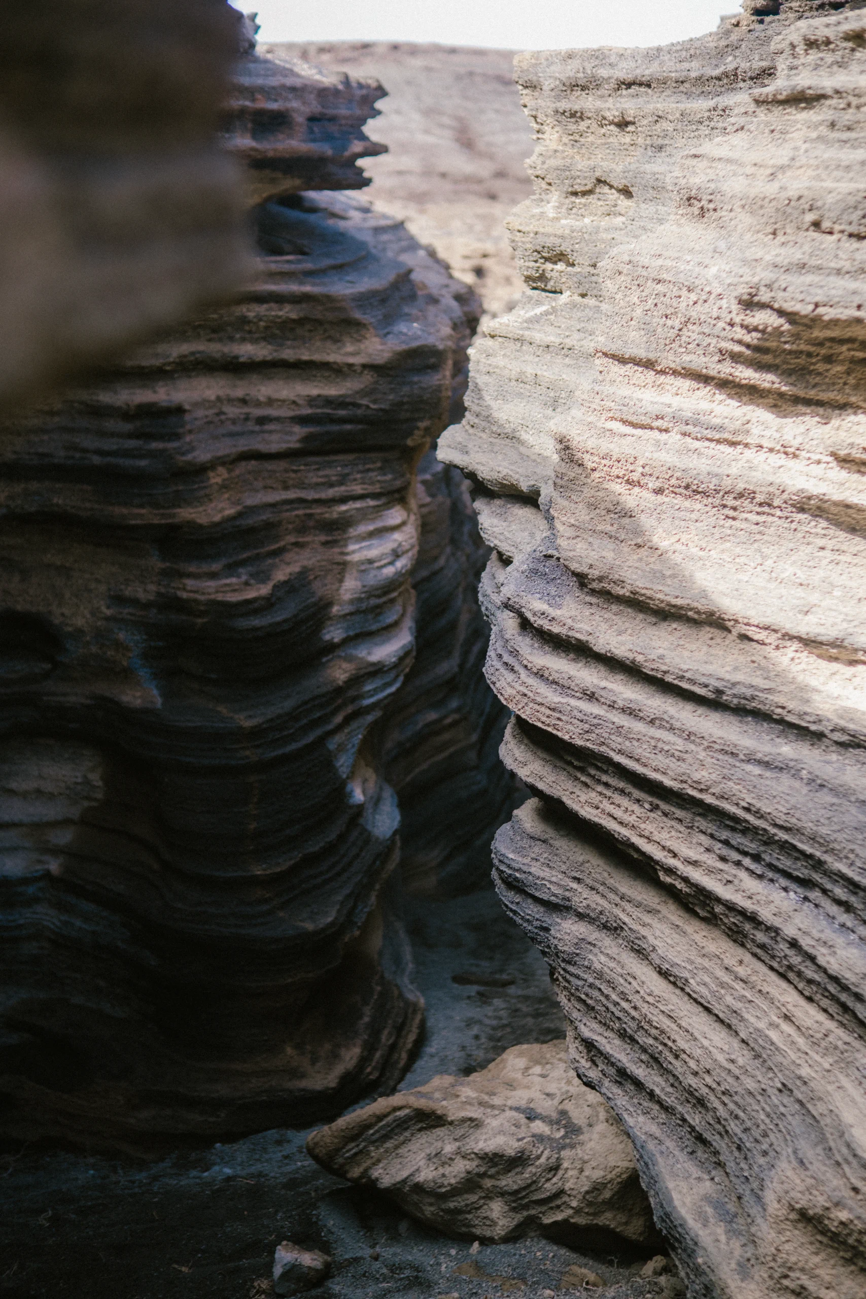 Narrow volcanic canyon of Las Grietas with layered rock formations.