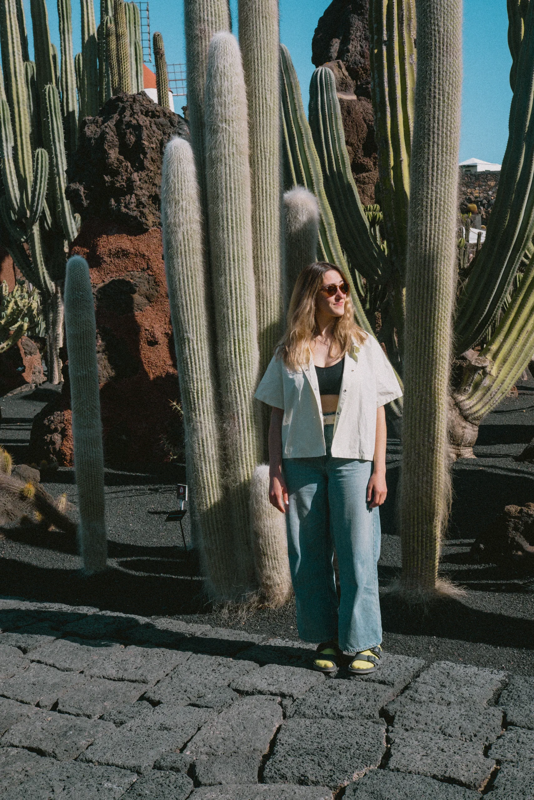 Letizia posing among the diverse cacti species in César Manrique's garden.