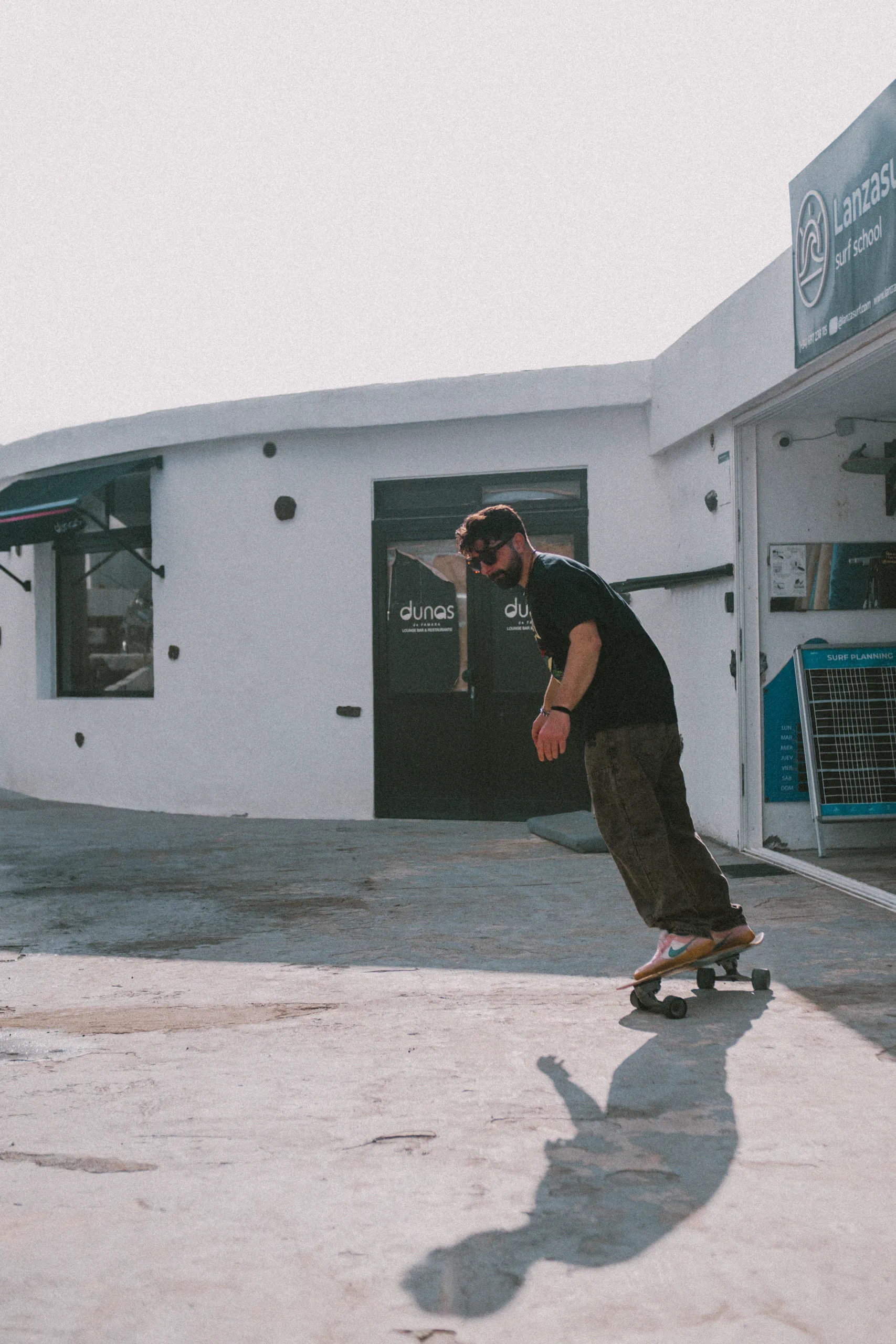 Iair skateing in front of lanzasurf school