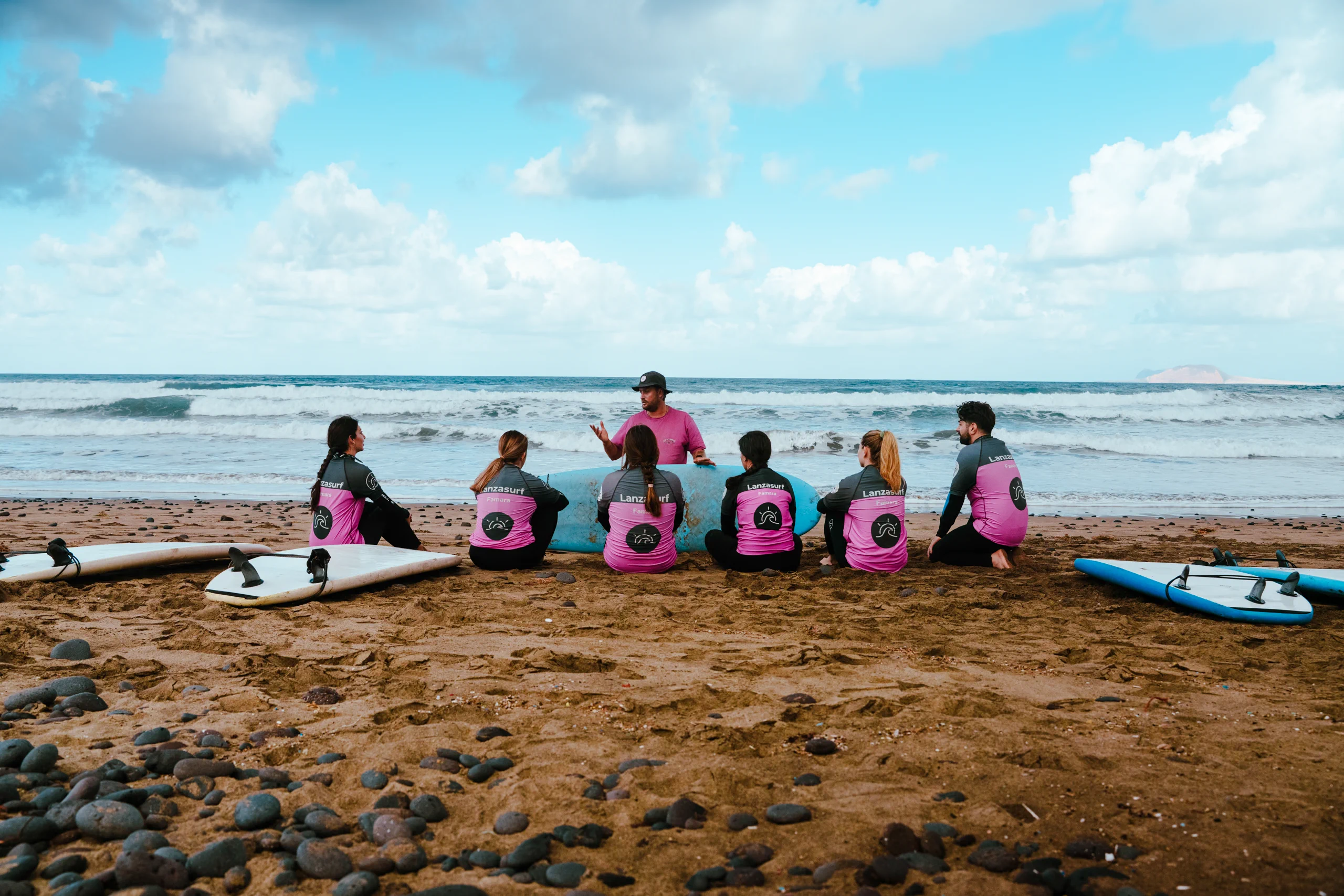 A surf lesson on the beach by LanzaSurf