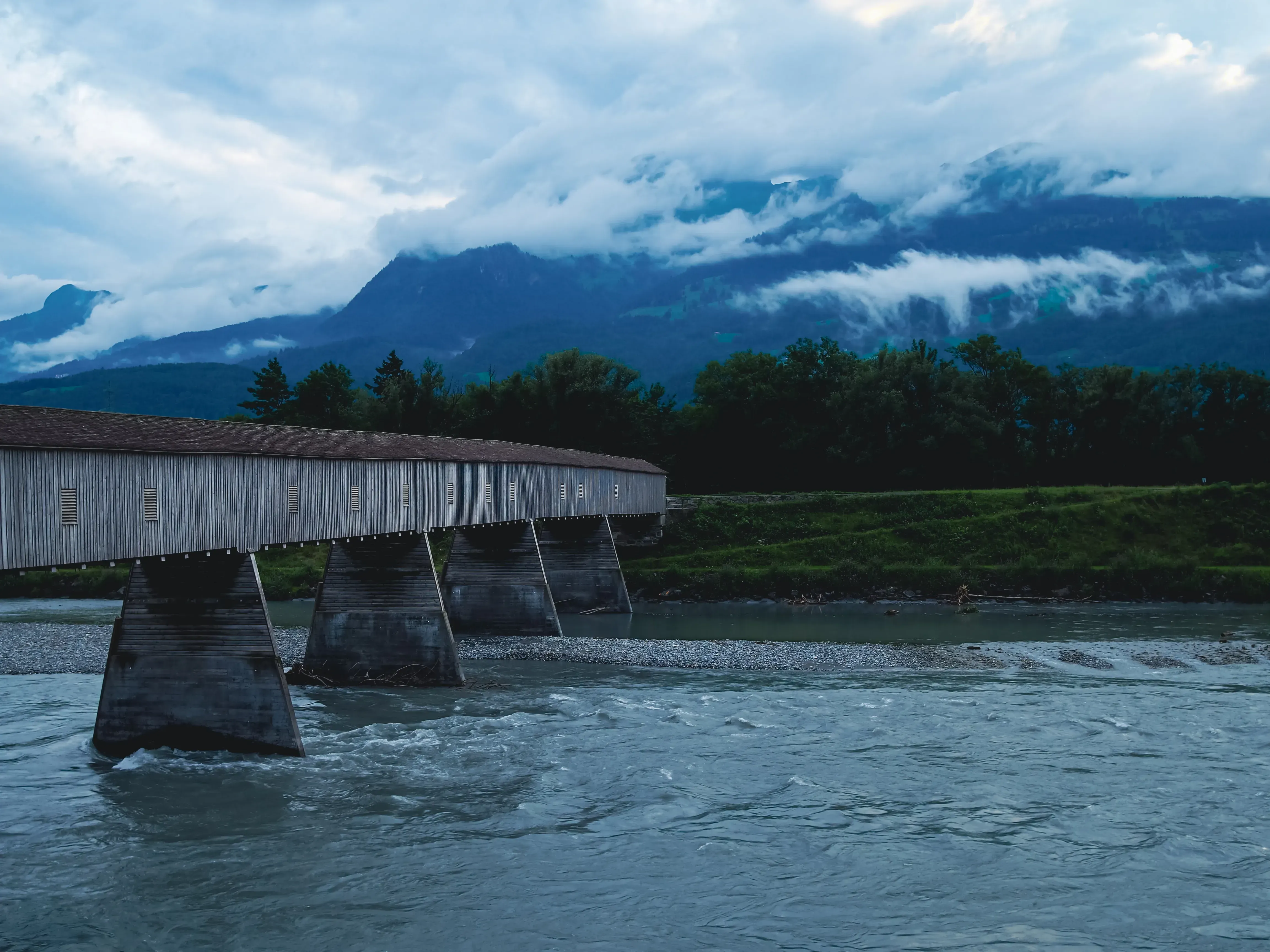 The wooden Old Rhine Bridge connecting Liechtenstein and Switzerland.