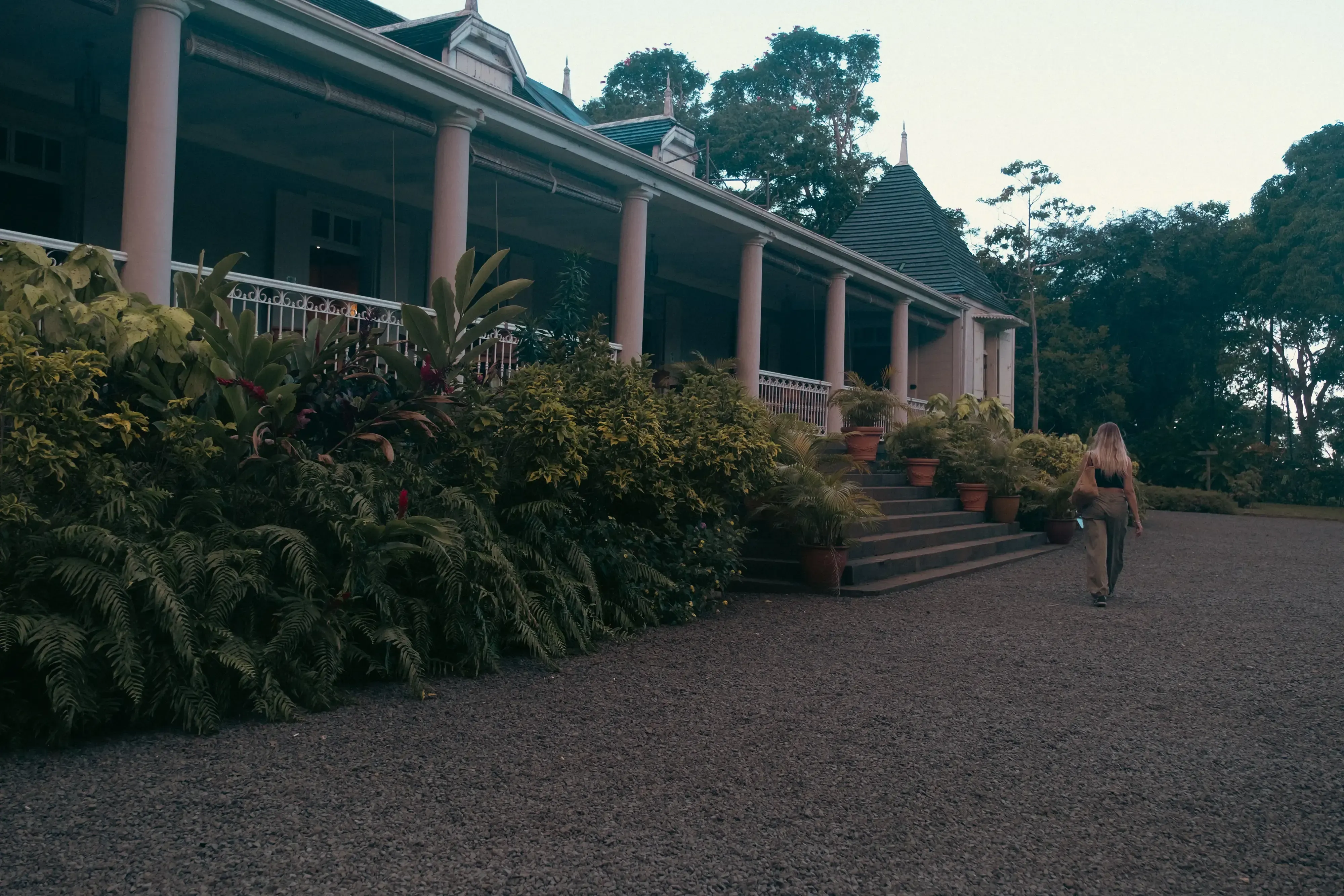 The elegant exterior façade of the historic colonial plantation house at Domaine de Saint Aubin.
