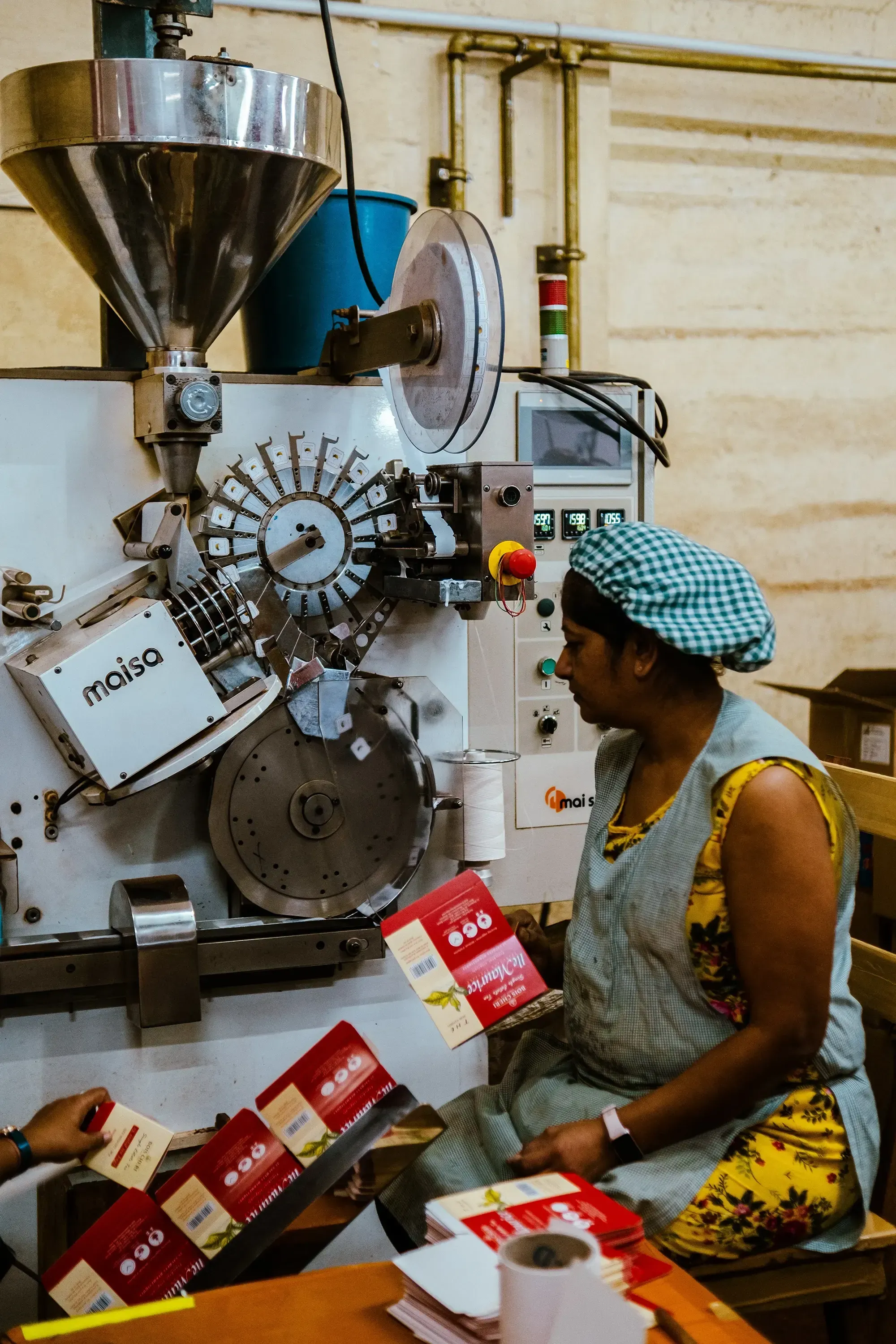 An employee at the factory of Bois Cheri