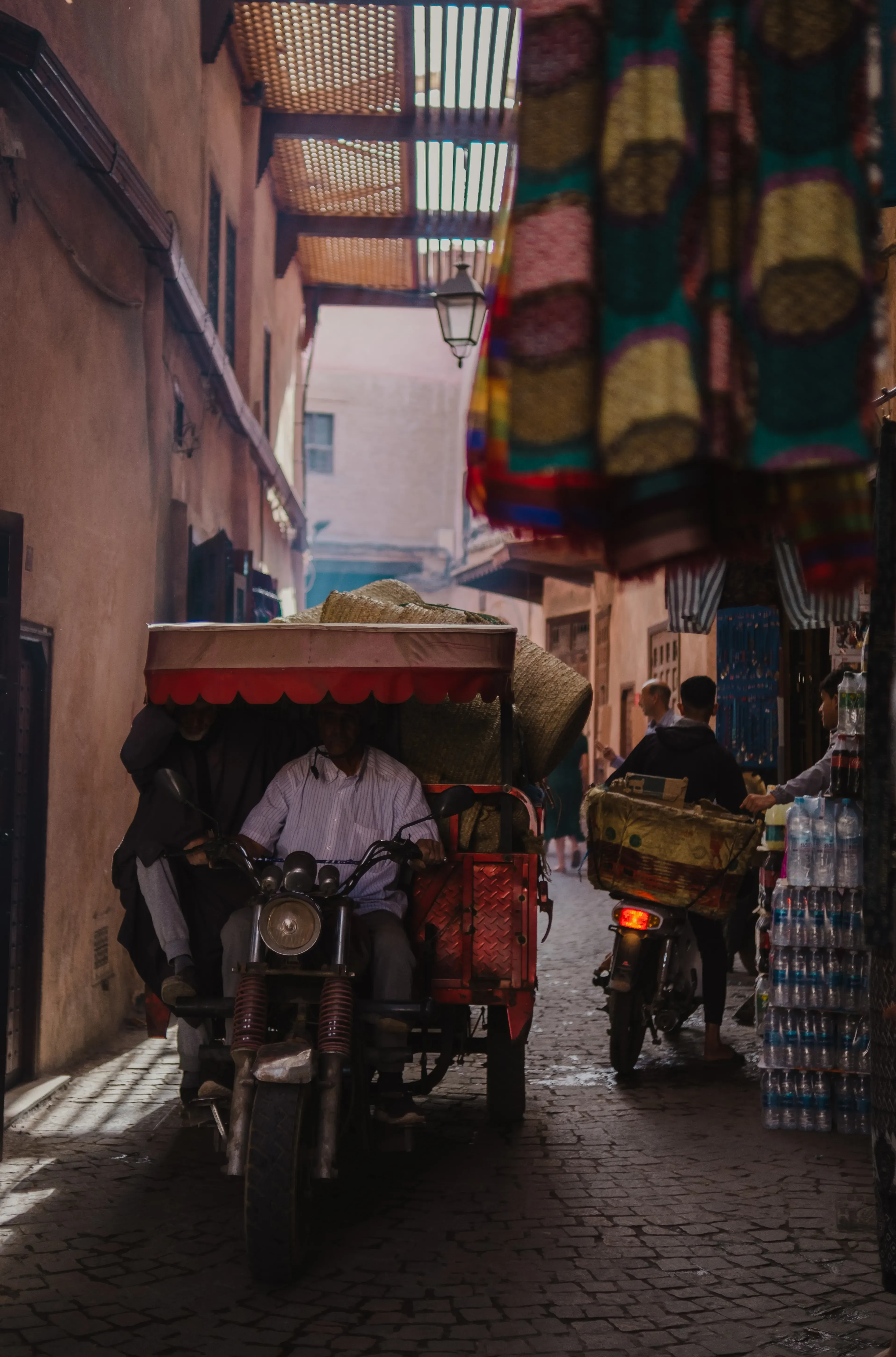 Narrow, busy street in the Marrakech medina.