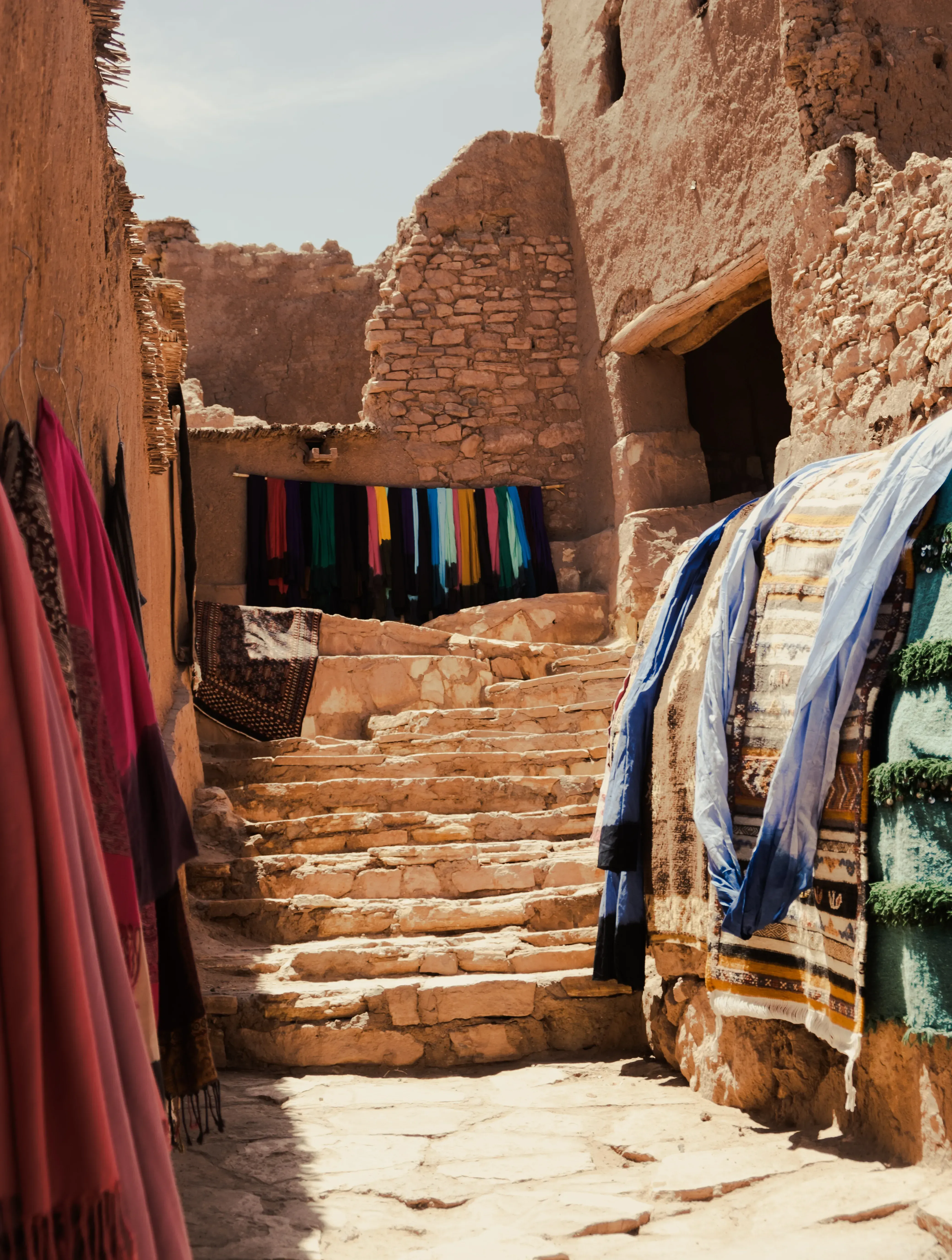Stone or earthen steps leading up inside a historic Kasbah building.