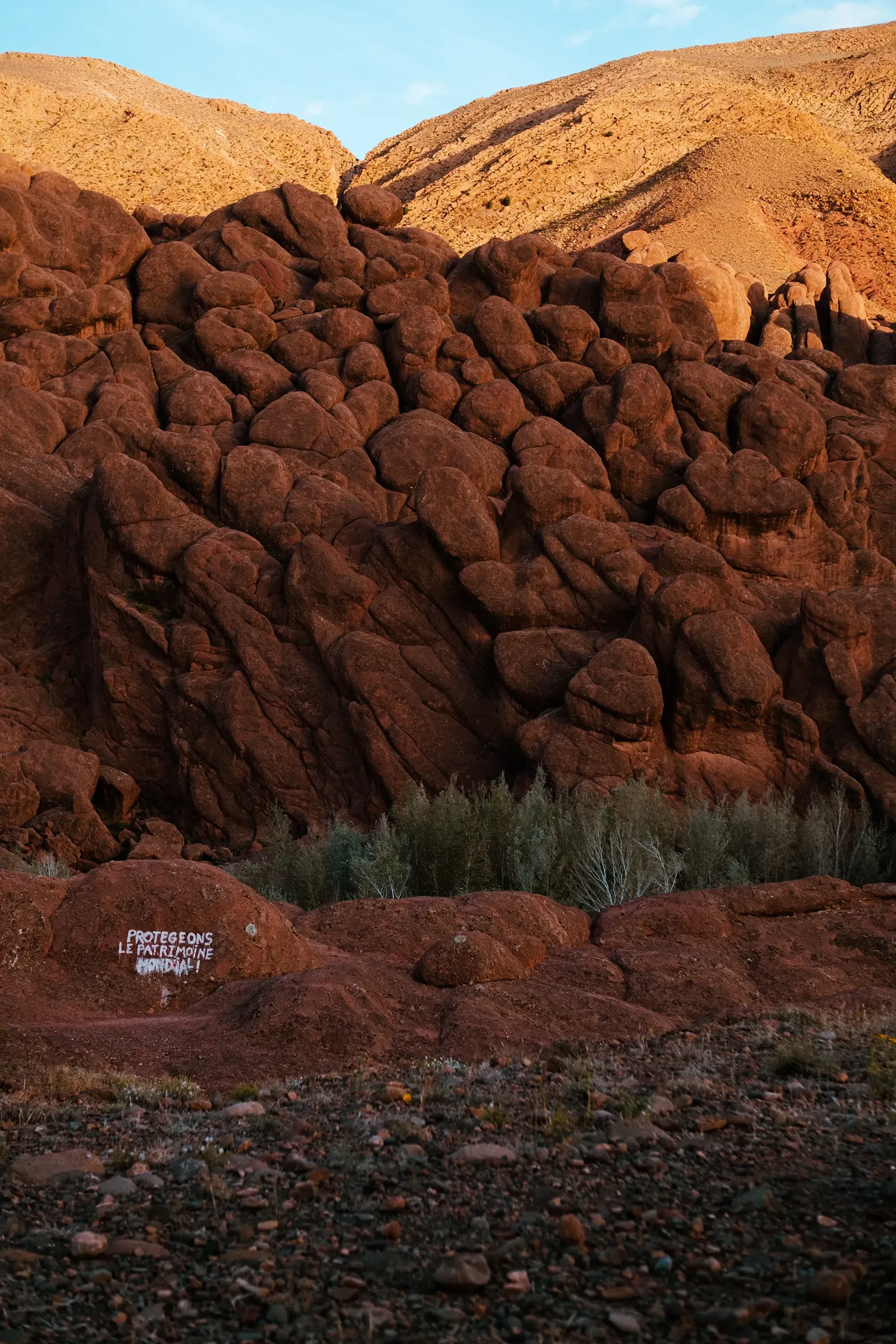 Close-up detail of the rough texture and structure of the rock formations.