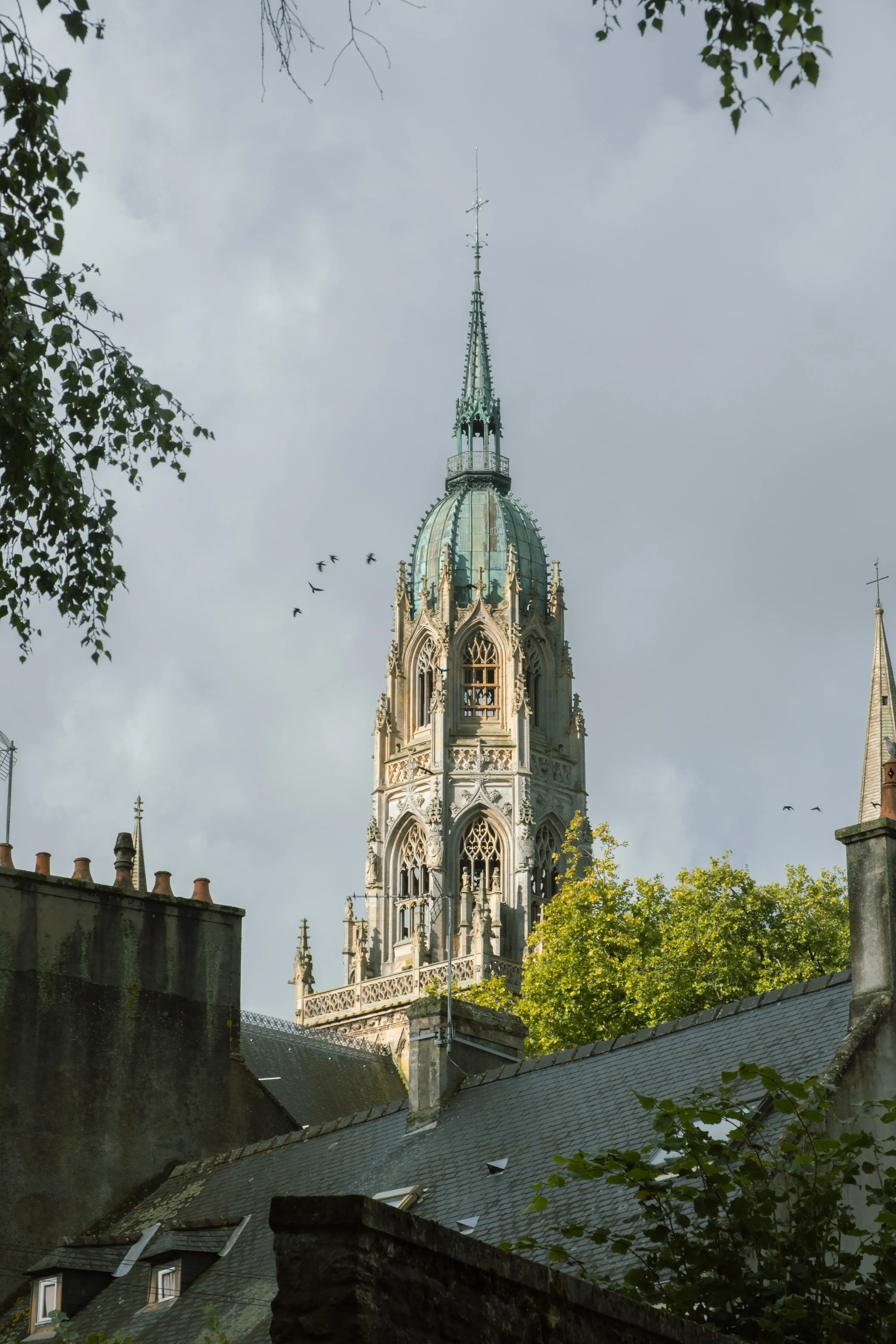The central tower or spire (campanile) of the Bayeux Cathedral.