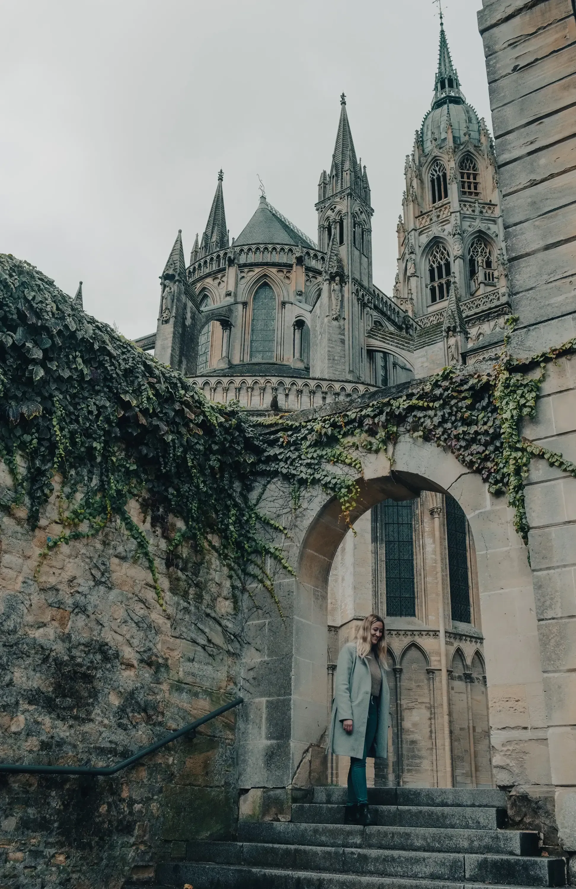 The historic Bayeux Cathedral (Cathédrale Notre-Dame de Bayeux), emphasizing its exterior grandeur.