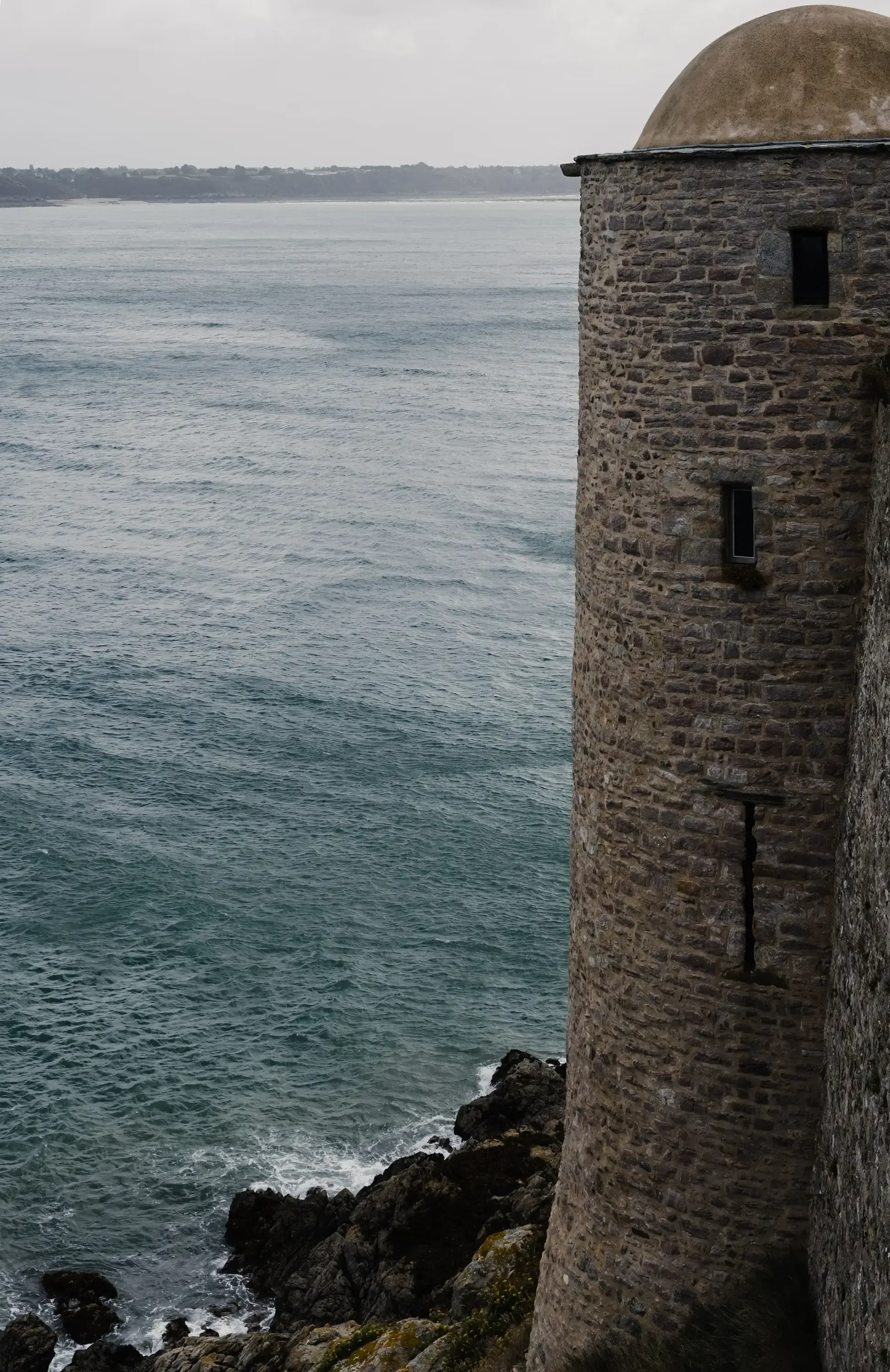 One of the fortified stone towers of the dramatic seaside castle, Fort La Latte.