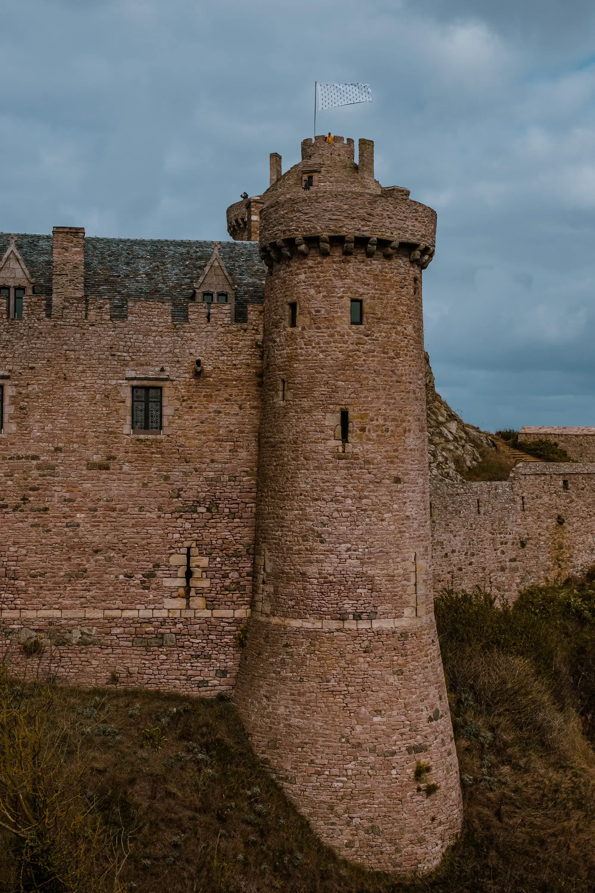 The exterior view of one of the fortified stone towers of Fort La Latte.
