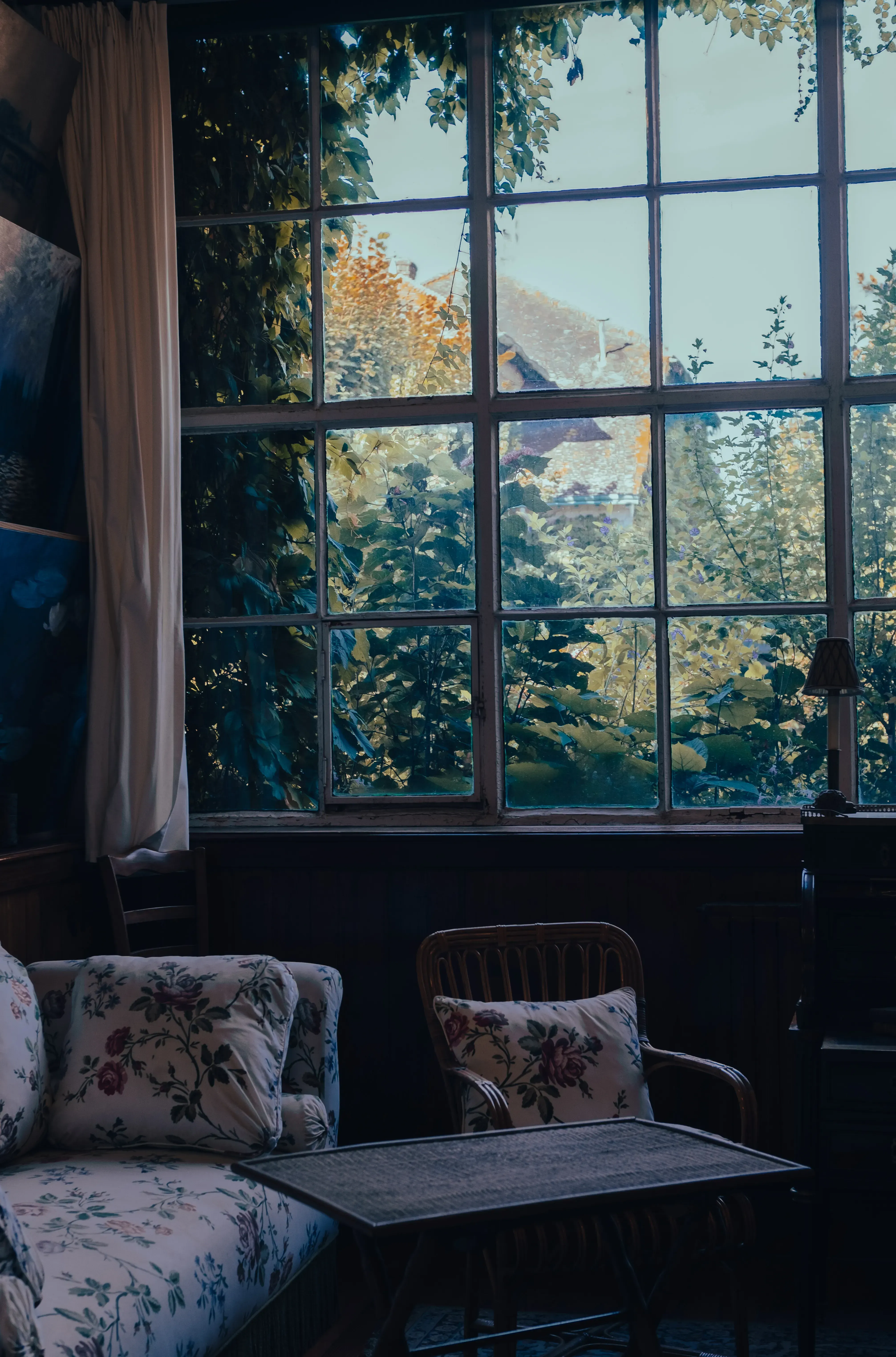 A view of one of the distinctive green-shuttered windows of Monet's house (Maison de Monet).