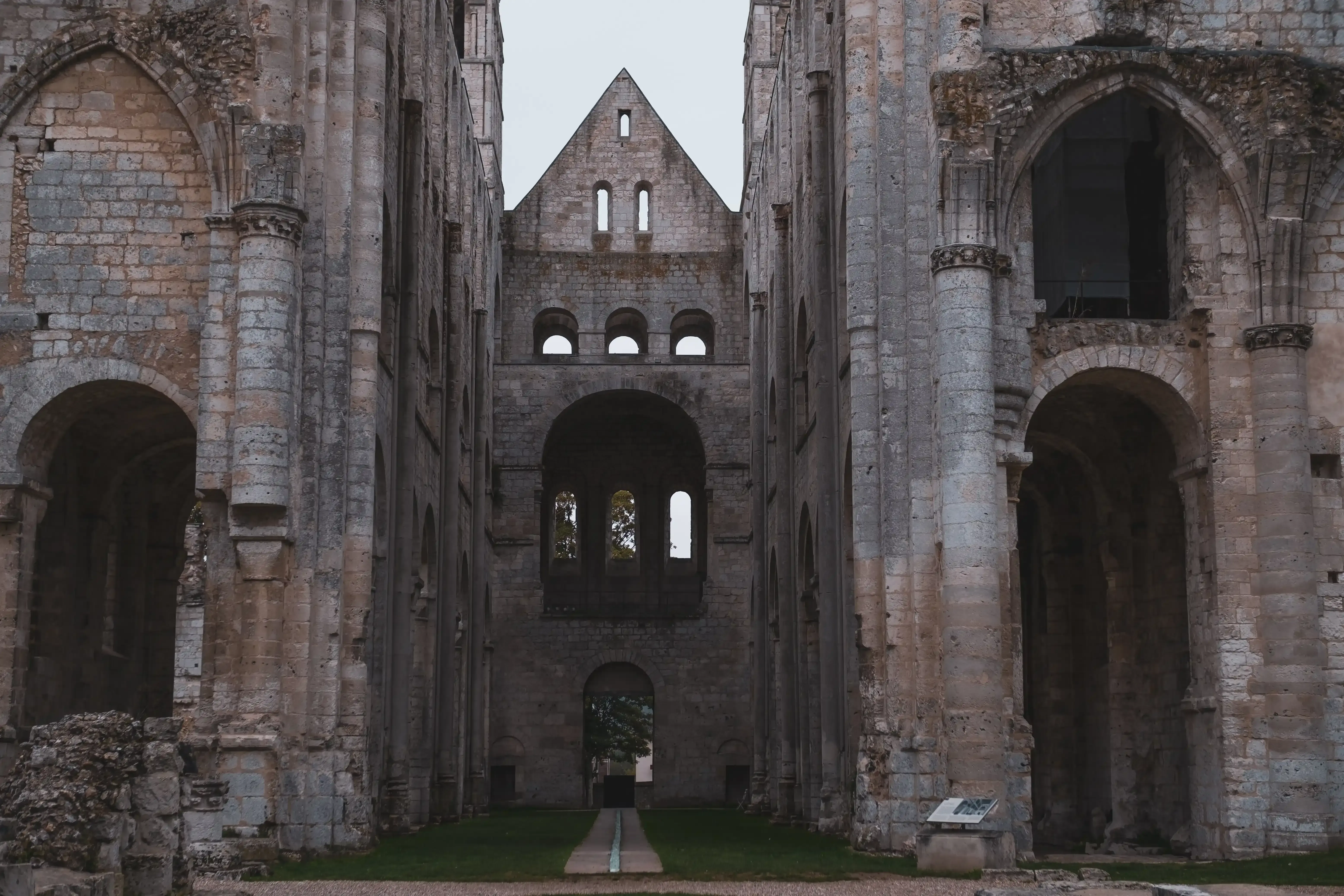 A view through the ruined walls of the vast central nave of the Abbey Church.