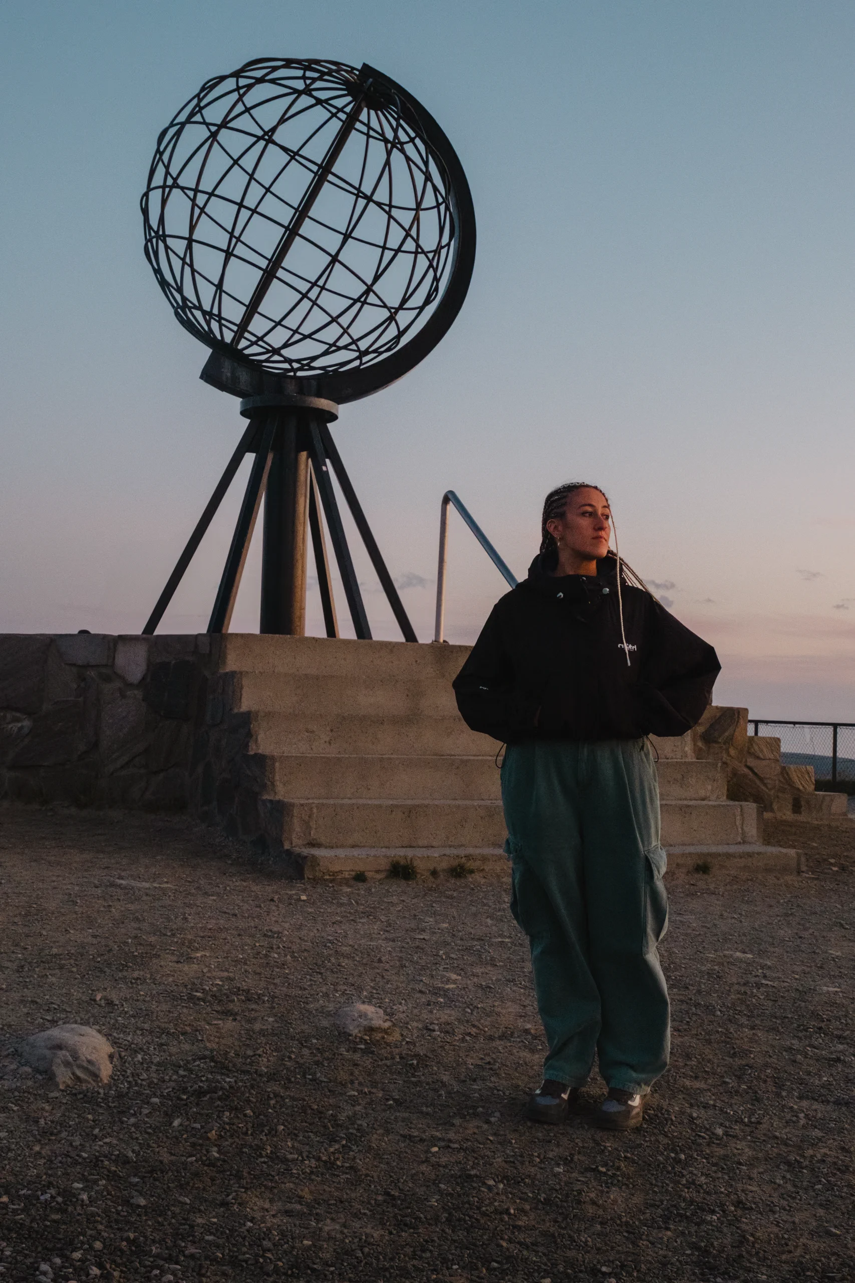 Letizia posing next to the iconic globe monument at North Cape.