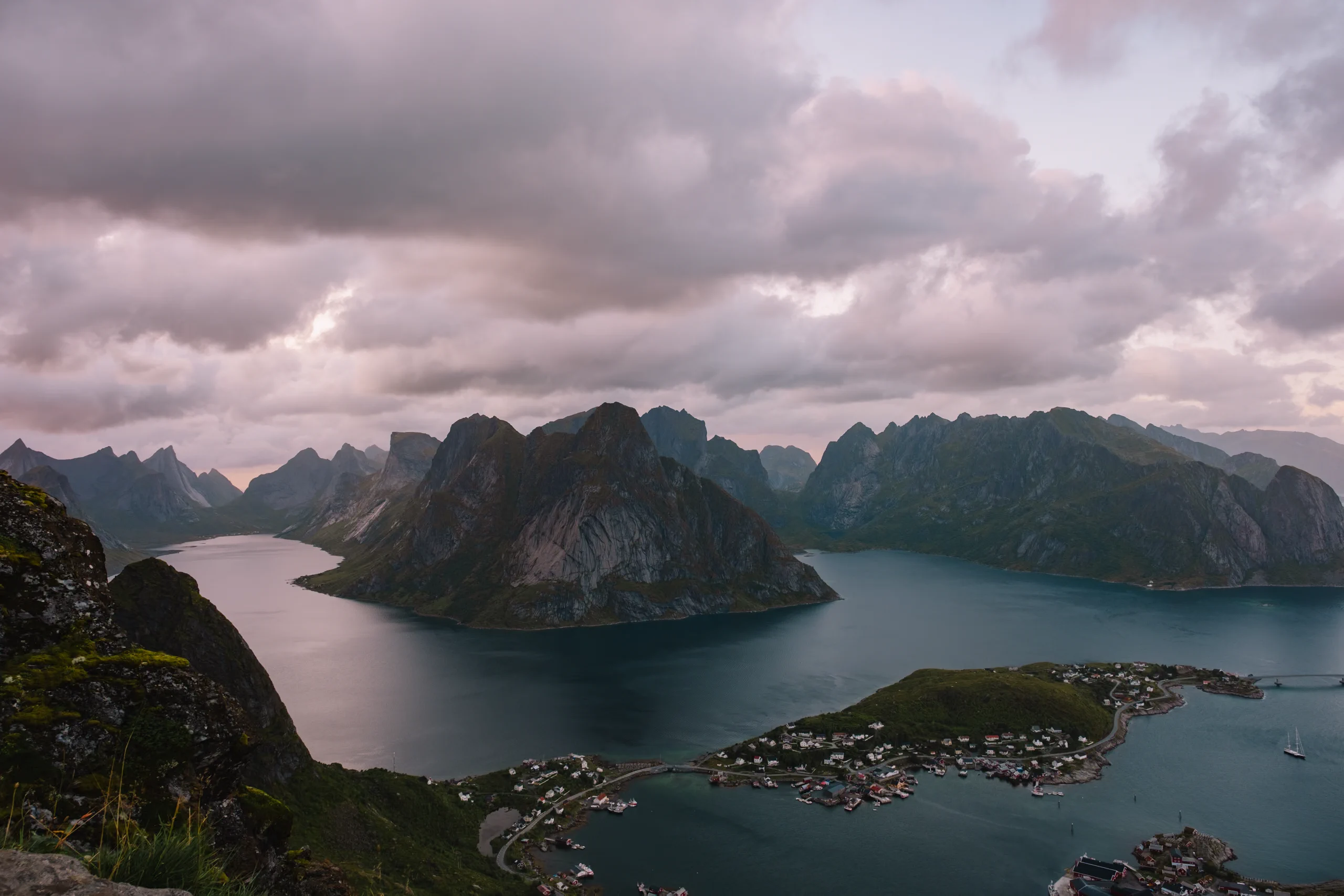 View from the panoramic point (Reinebringen) facing the surrounding jagged mountains of Lofoten.
