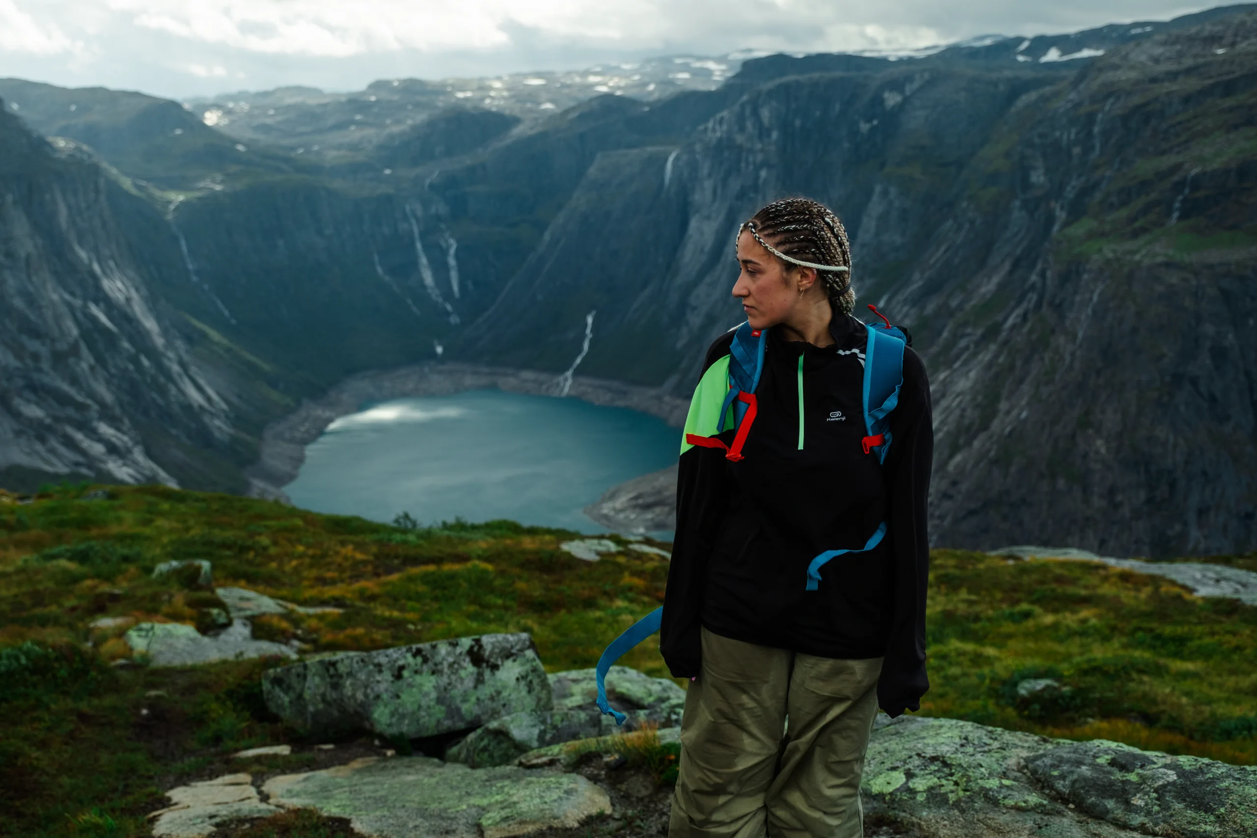 Letizia on the trail towards Trolltunga (Troll's Tongue), with a large lake visible behind her.