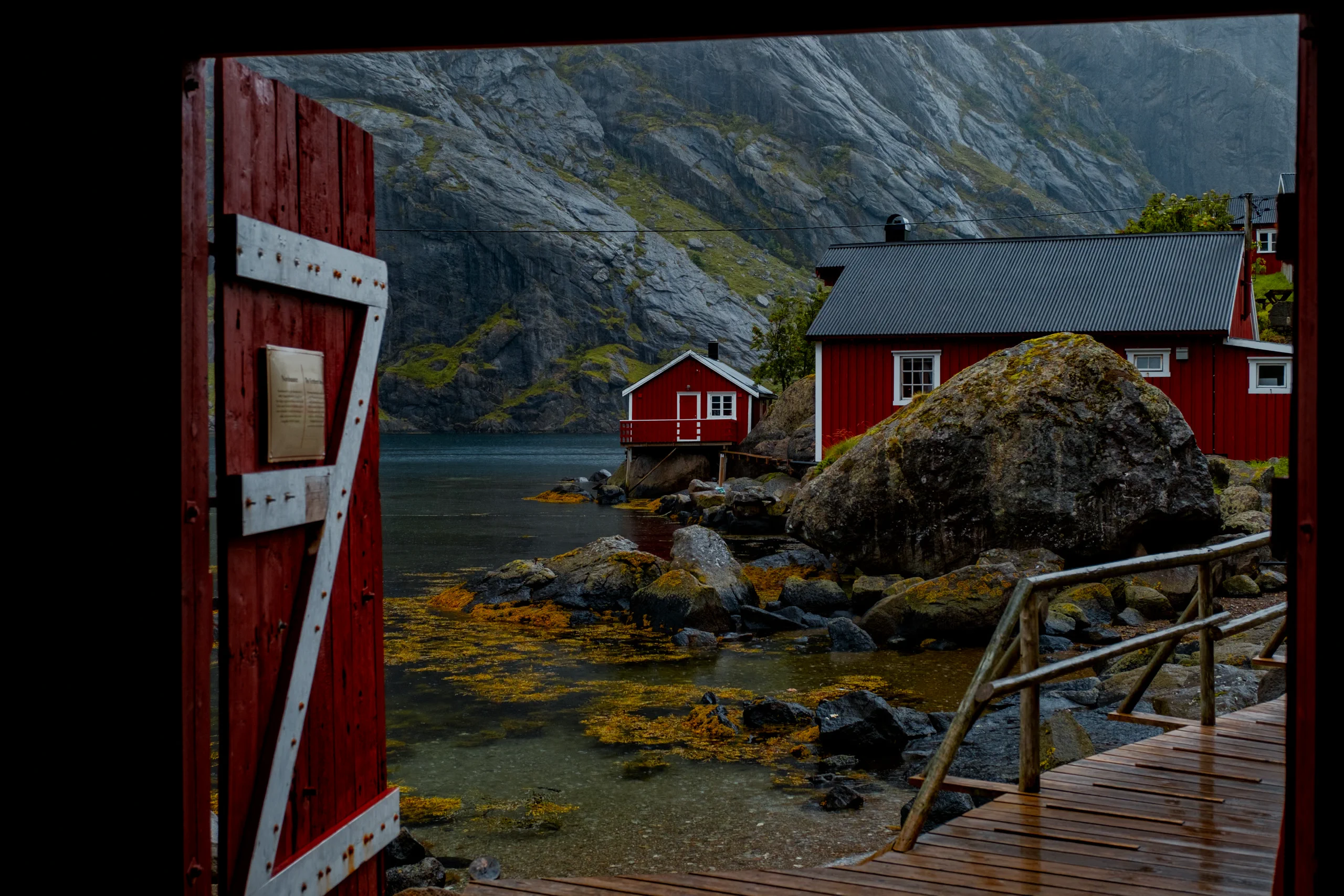 Charming Norwegian village featuring traditional red houses (rorbuer) by the water