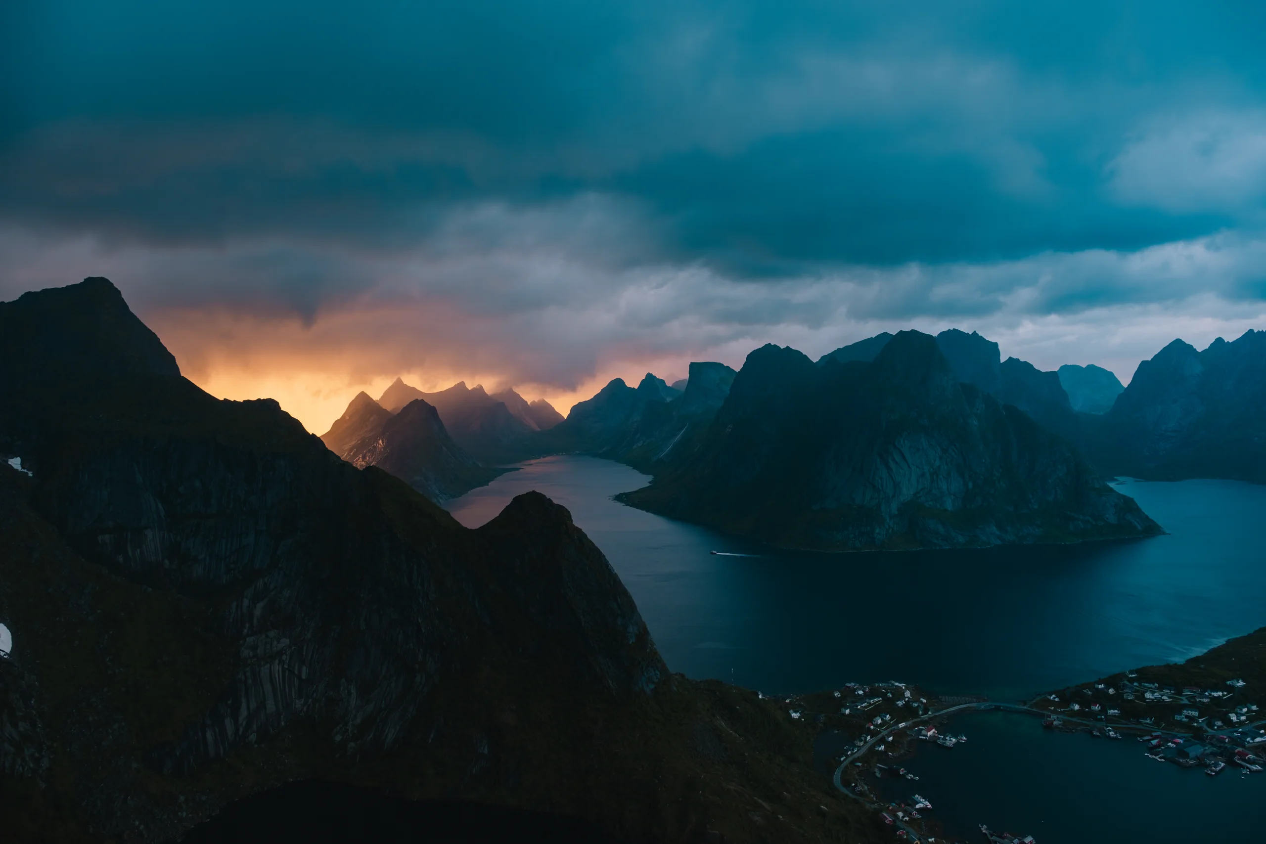 Panoramic view from the top of the steep steps (likely Reinebringen) overlooking the Lofoten Islands.