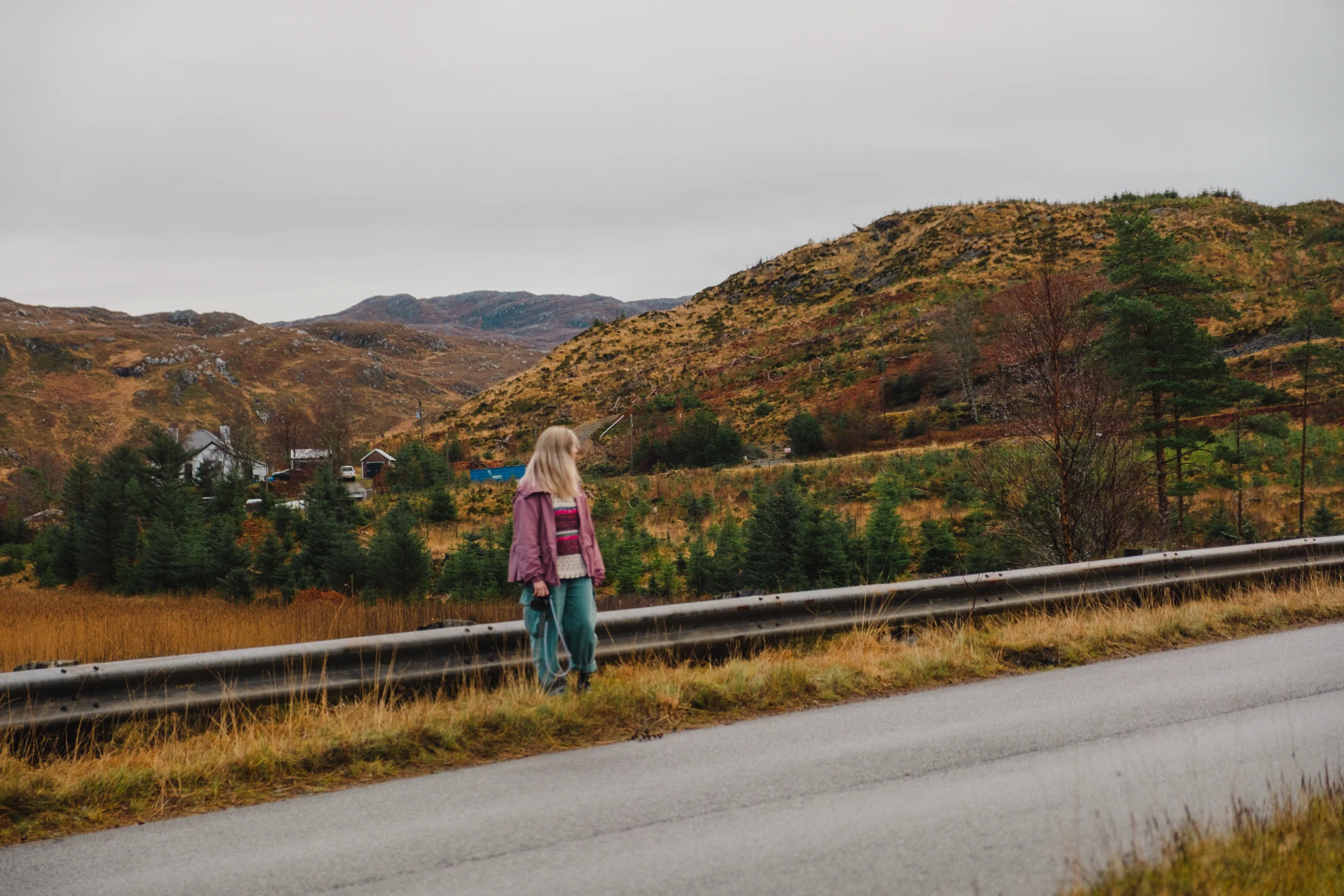 Letizia on a road in the highlands