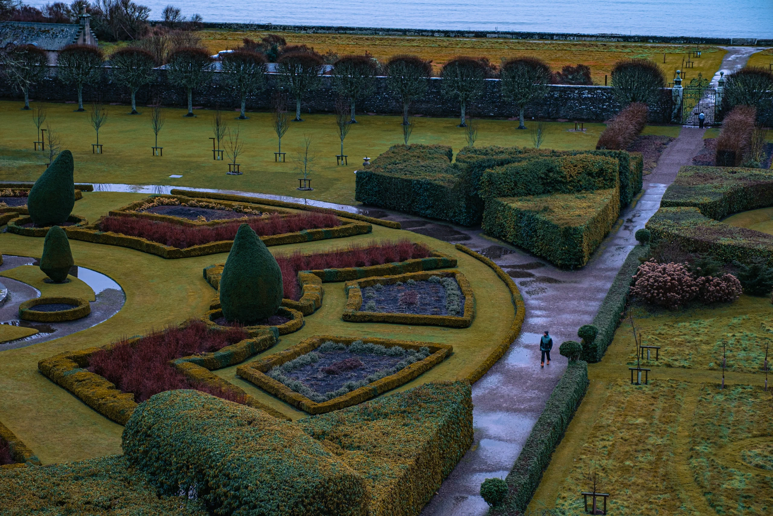 Stefano walking in the gardens of a scotland castle