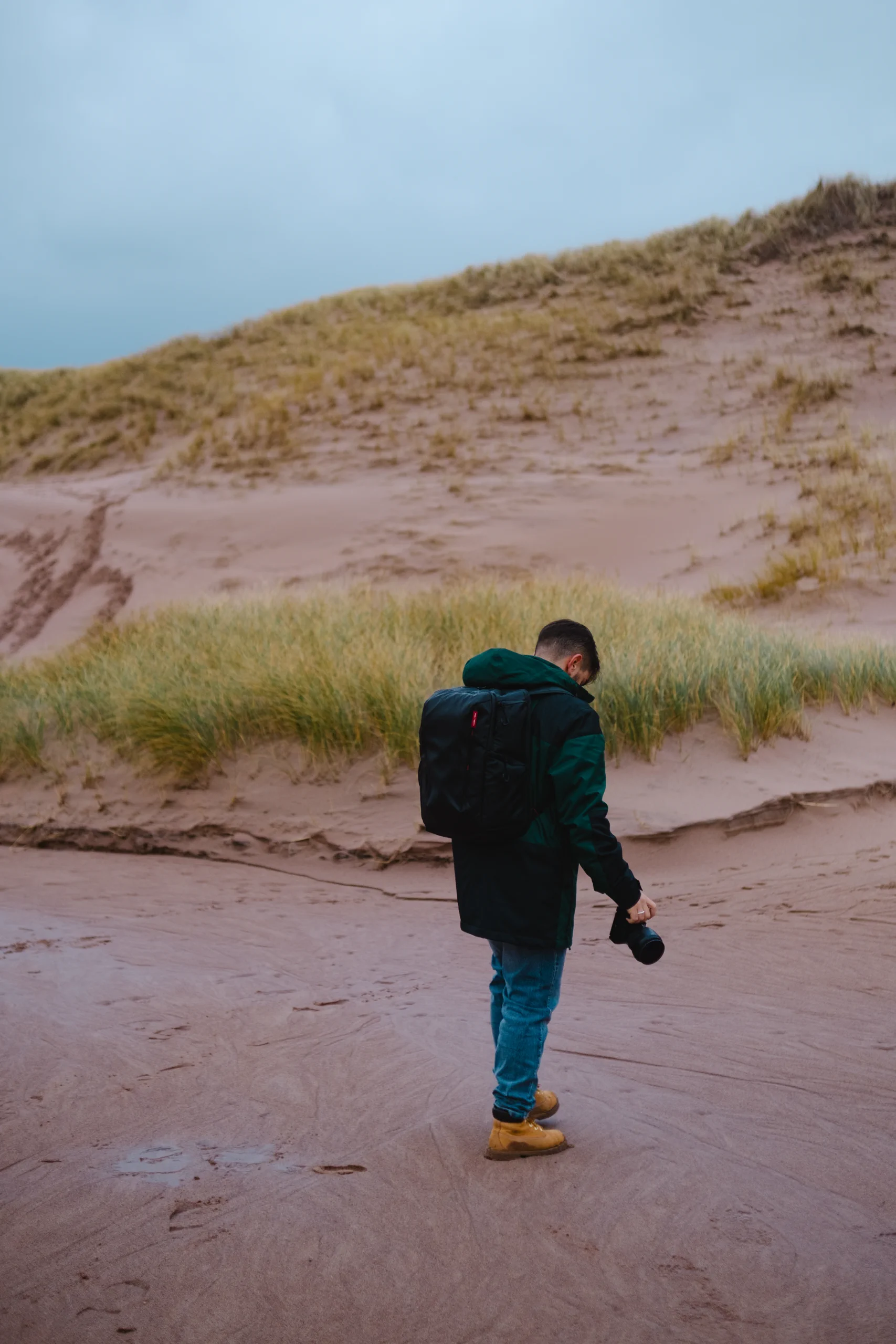 ieser walking in Sandwood Bay Beach