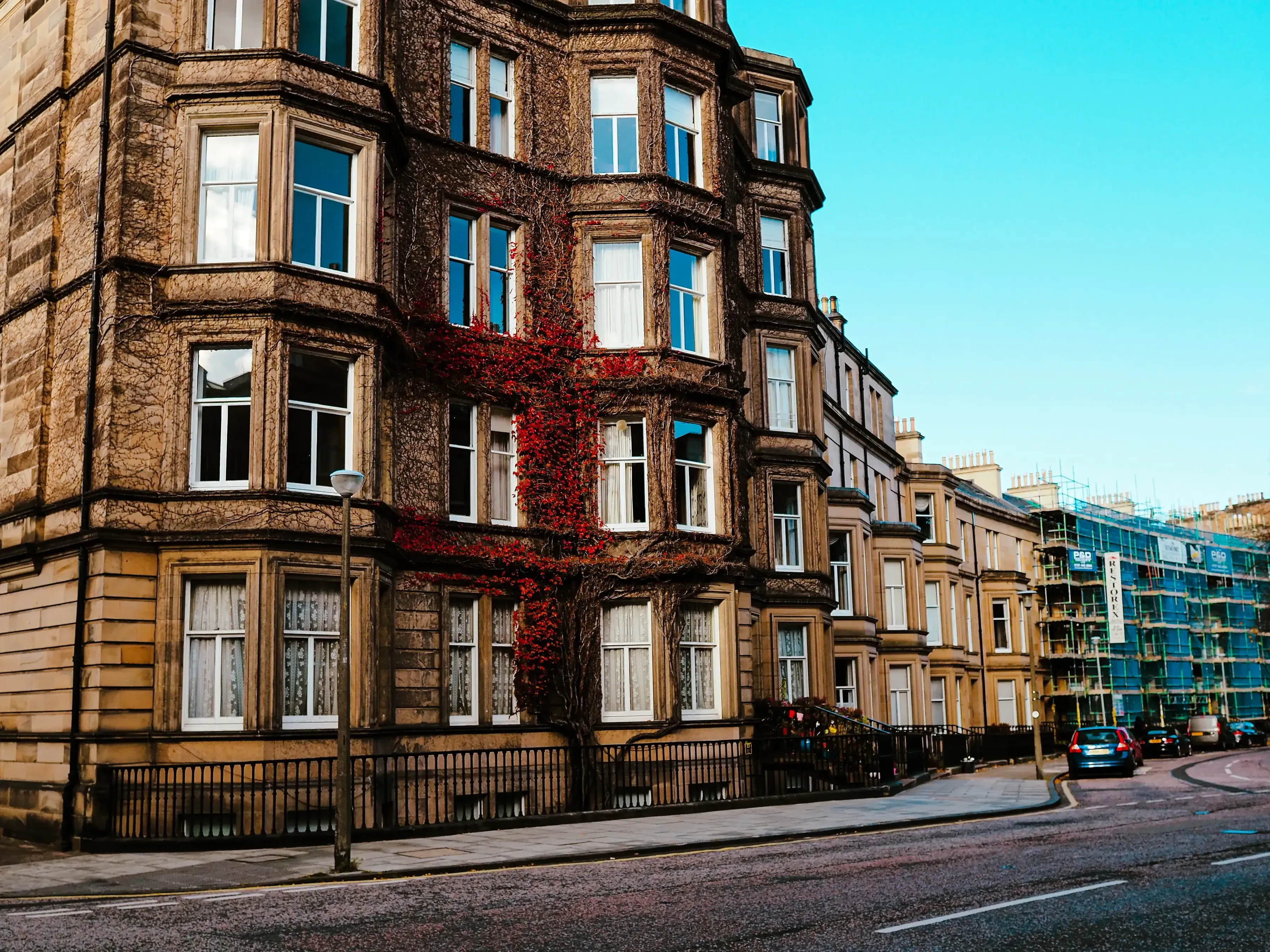 Detailed view of the ornate stone facade of a historic building in Edinburgh.