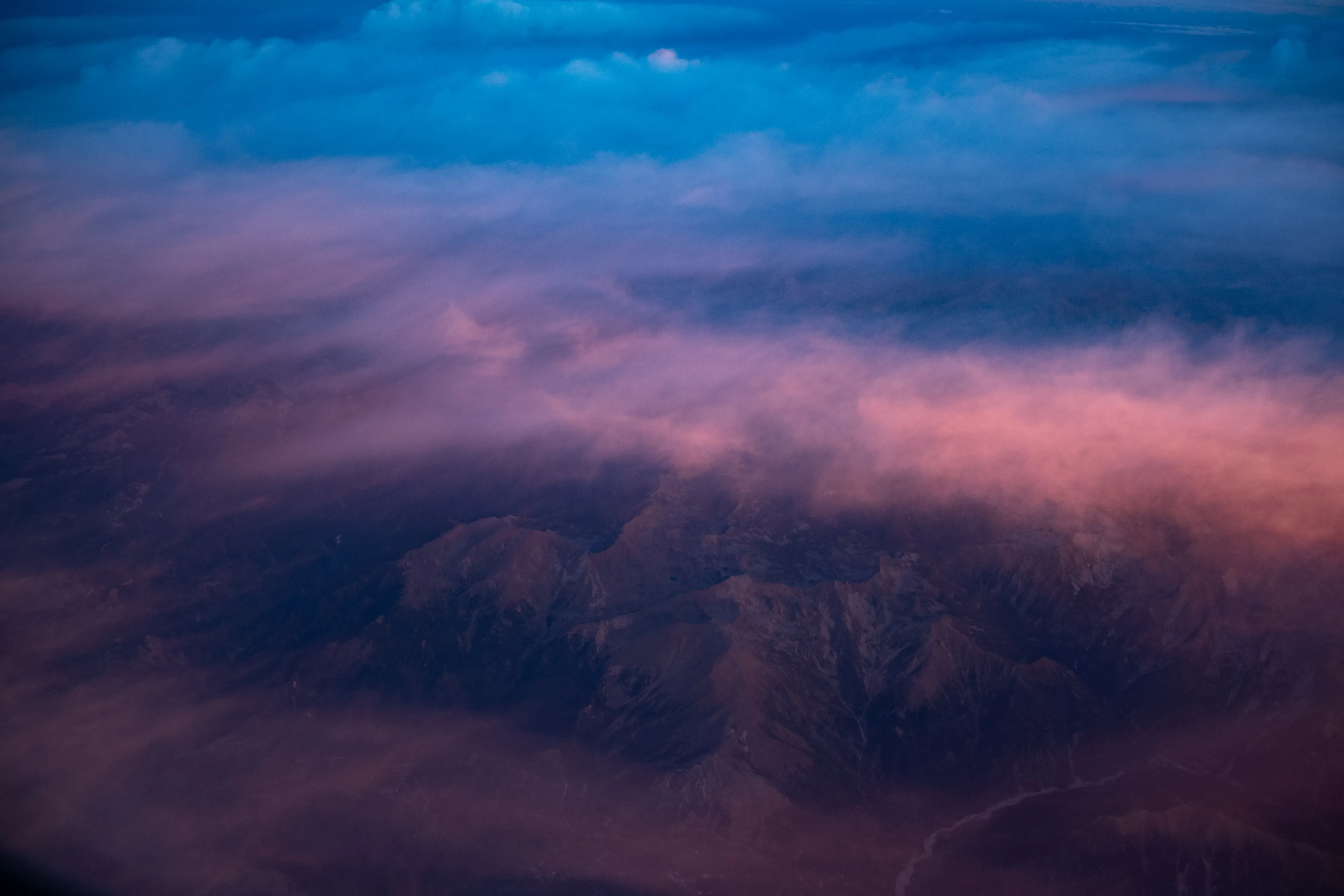 Panoramic aerial or high-vantage point view showcasing the varied landscape and coastline of Tenerife island.