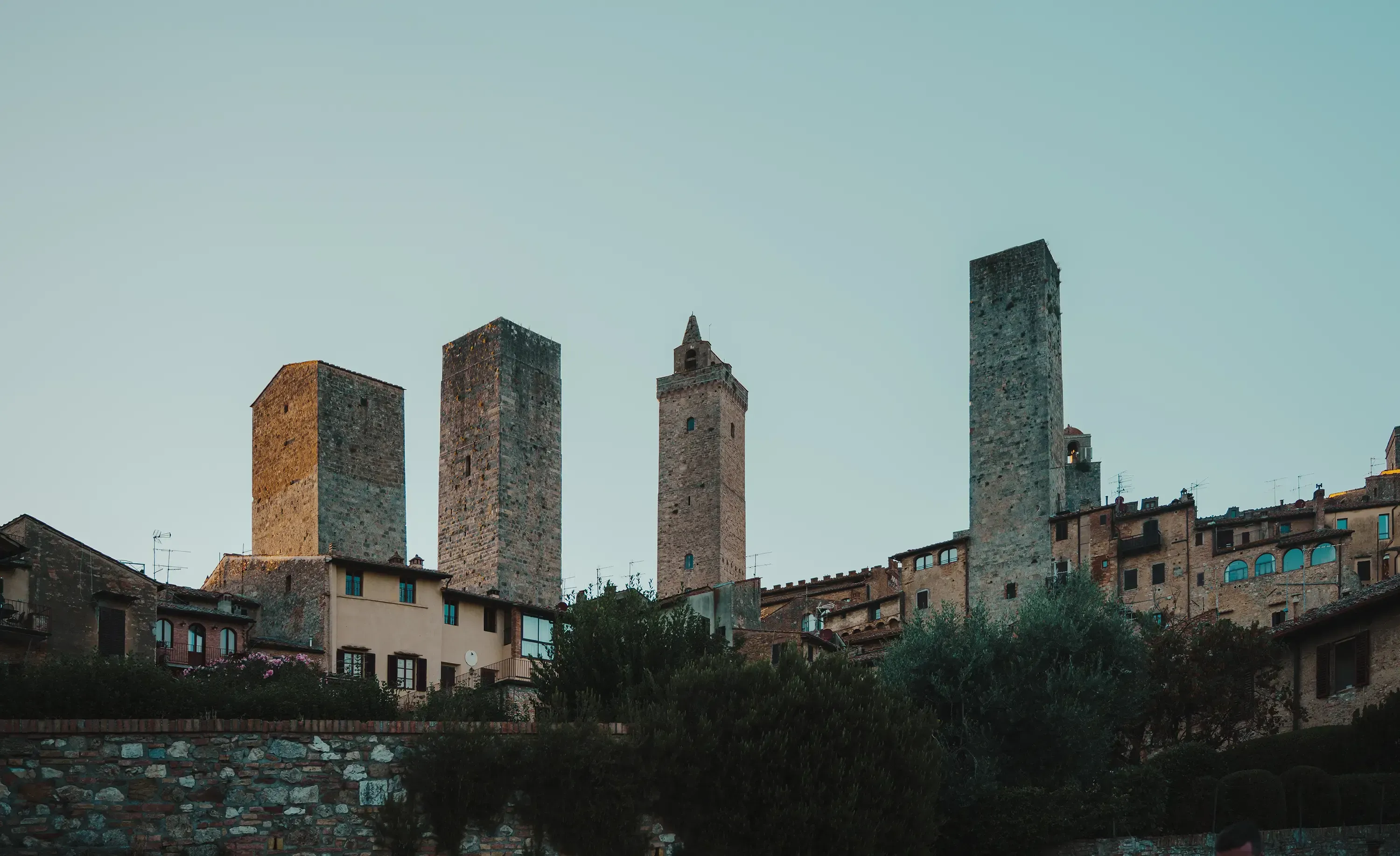 The iconic medieval stone towers dominating the skyline of San Gimignano.