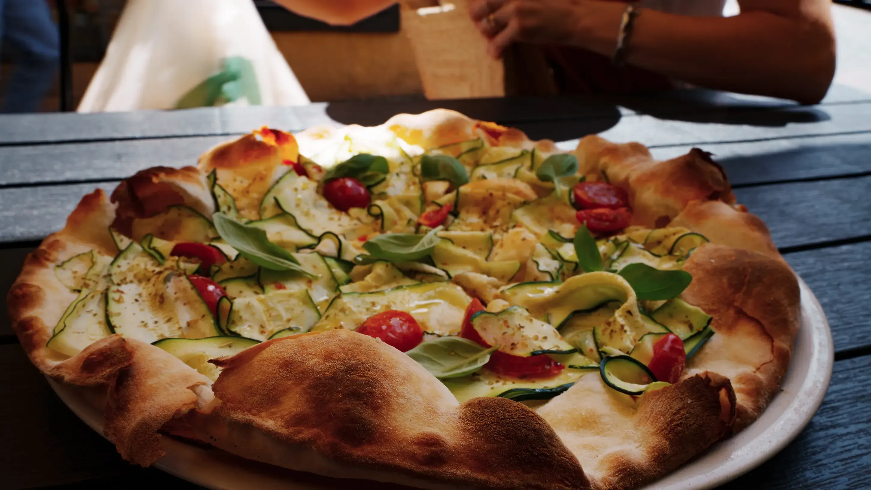 Close-up of a delicious pizza served at a restaurant in the town of Volterra.