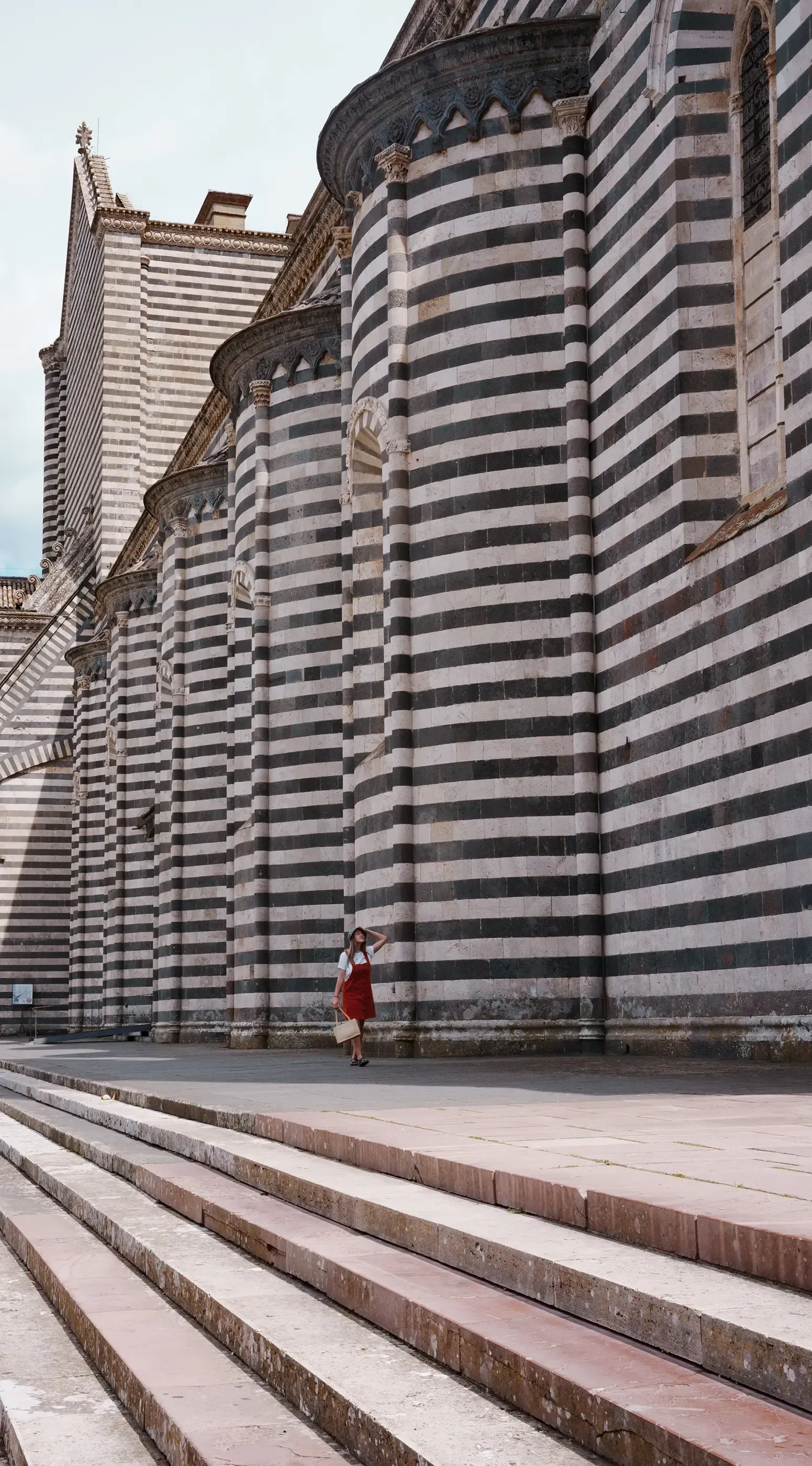 Letizia posing in front of the ornate facade of the main Cathedral (Duomo).