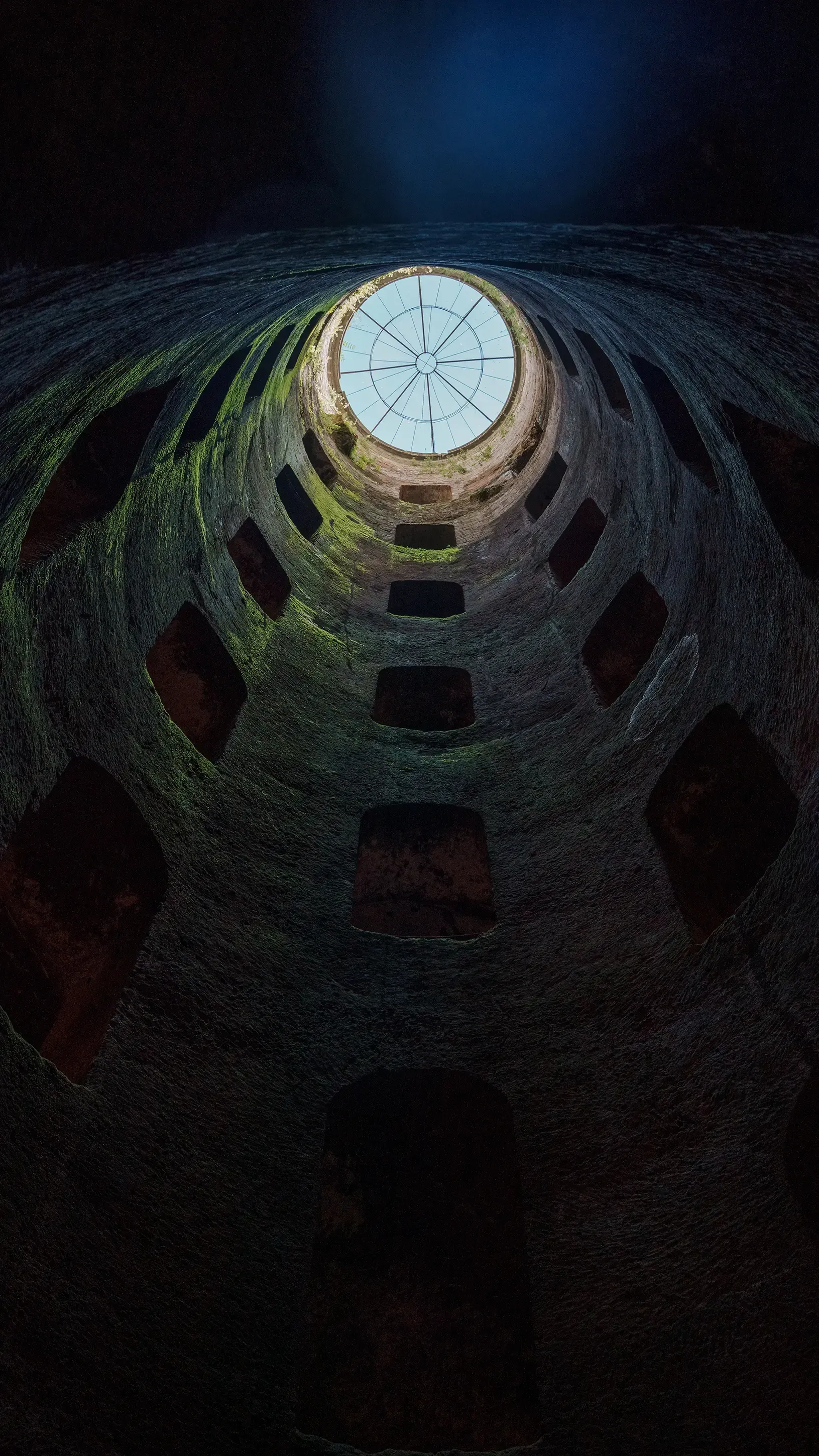 View from the bottom of St. Patrick's Well (Pozzo di San Patrizio), looking up at the light filtering from the opening.