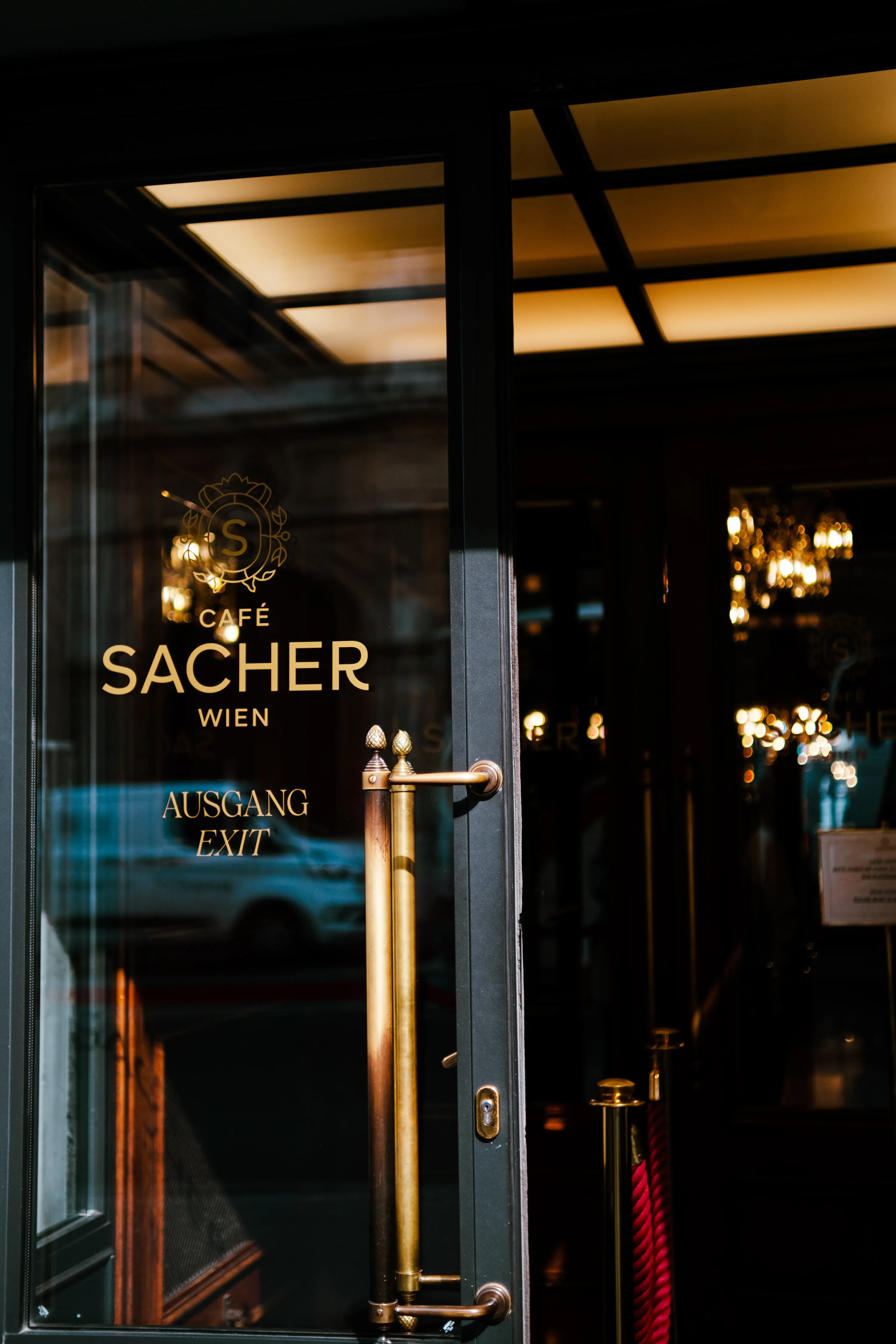 Exterior entrance facade of the renowned Hotel Sacher in Vienna.