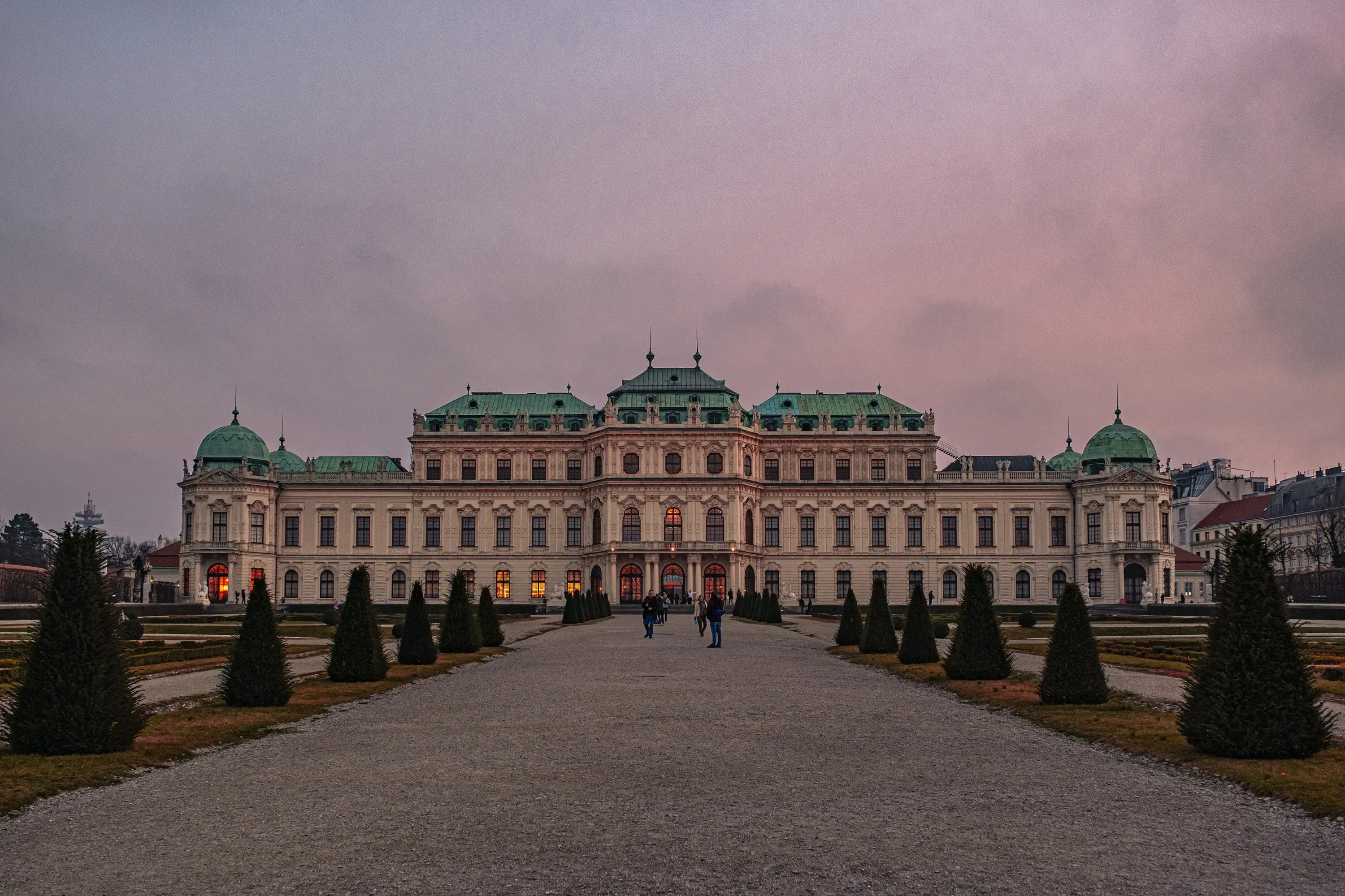 The Belvedere Palace in Vienna illuminated by the warm light of sunset.