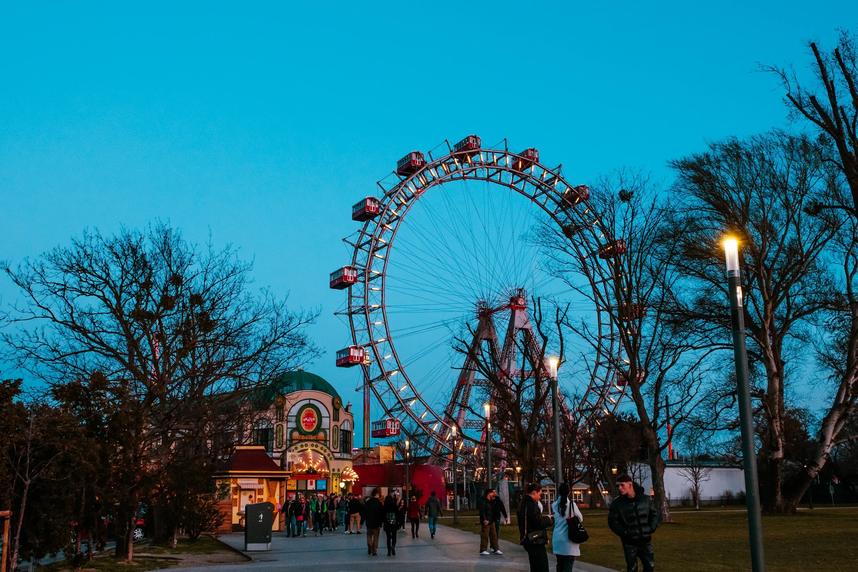 Distant view of the entire Giant Ferris Wheel structure dominating the skyline.